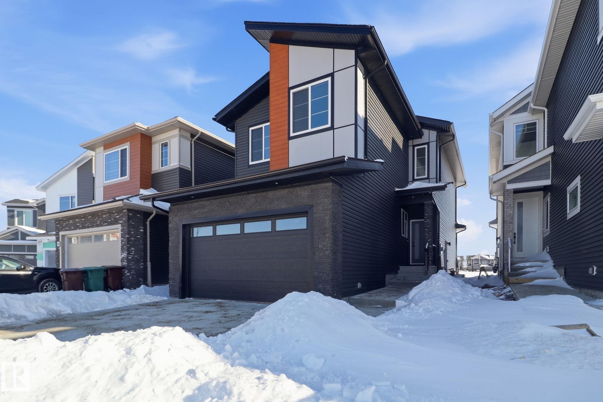 Modern home with an attached garage - 90 Eldridge Point(E), St. Albert, AB - Outdoor With Facade
