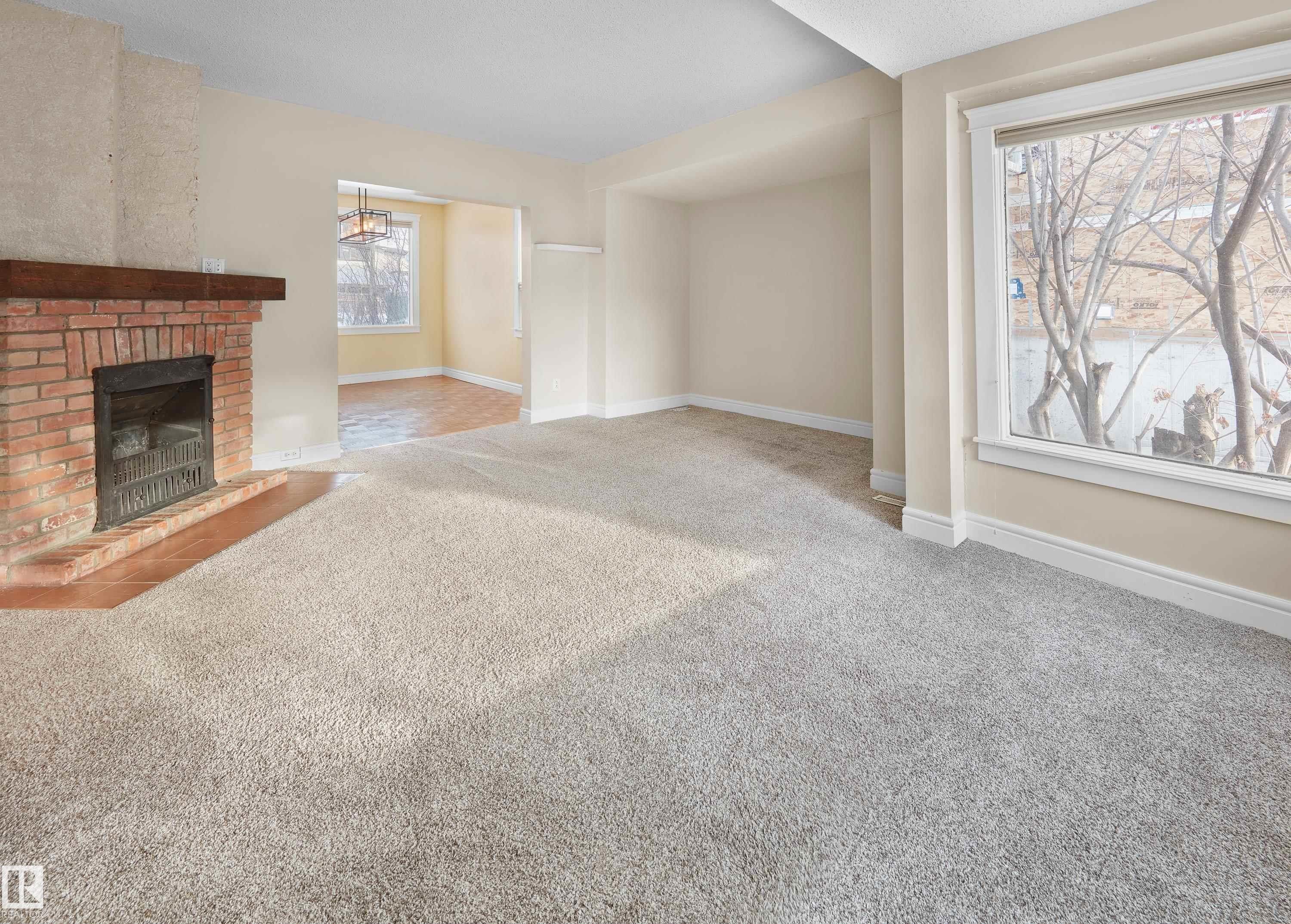 11212 75 Avenue, Edmonton, AB - Indoor Photo Showing Living Room With Fireplace