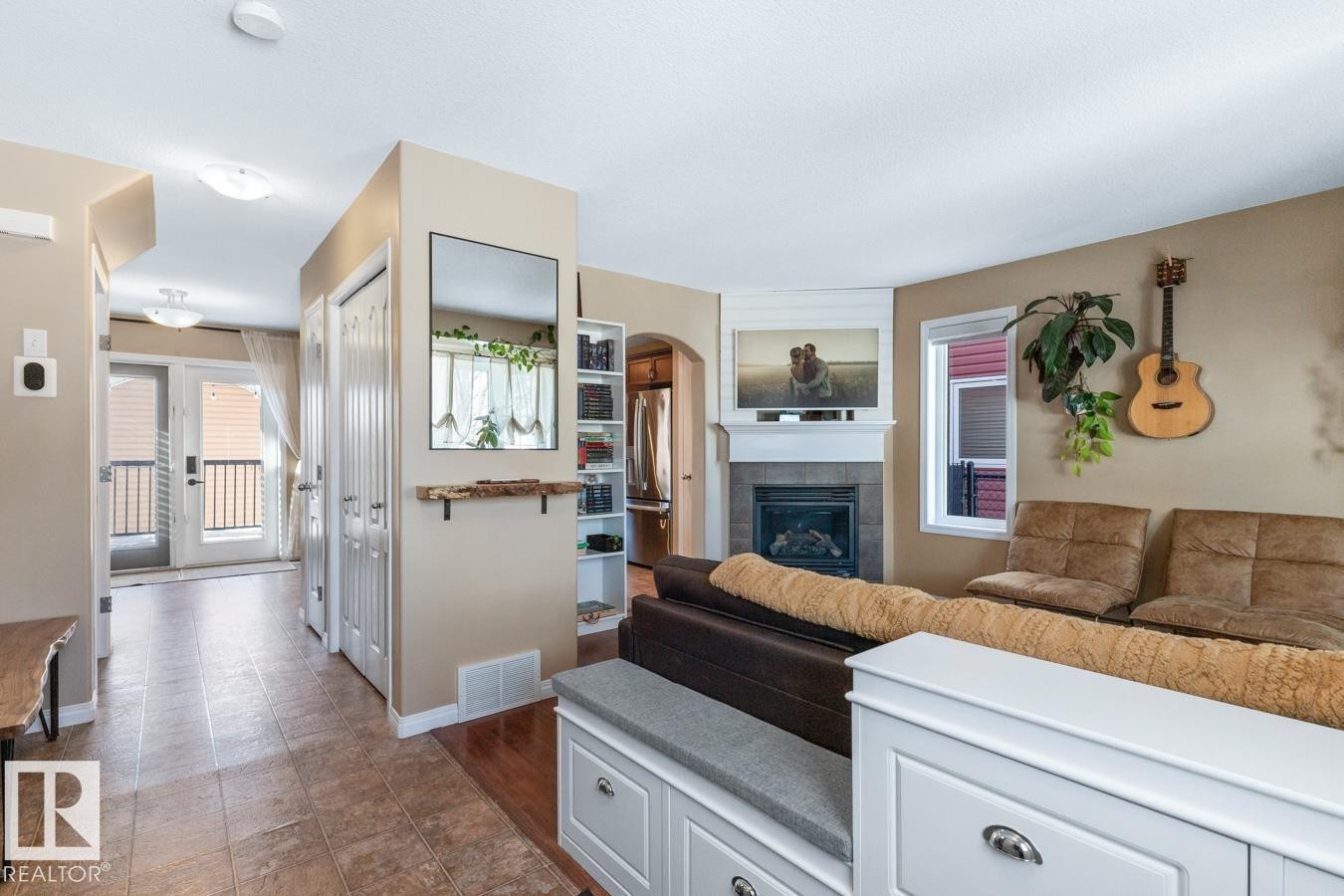 3820 53 Street, Gibbons, AB - Indoor Photo Showing Living Room With Fireplace