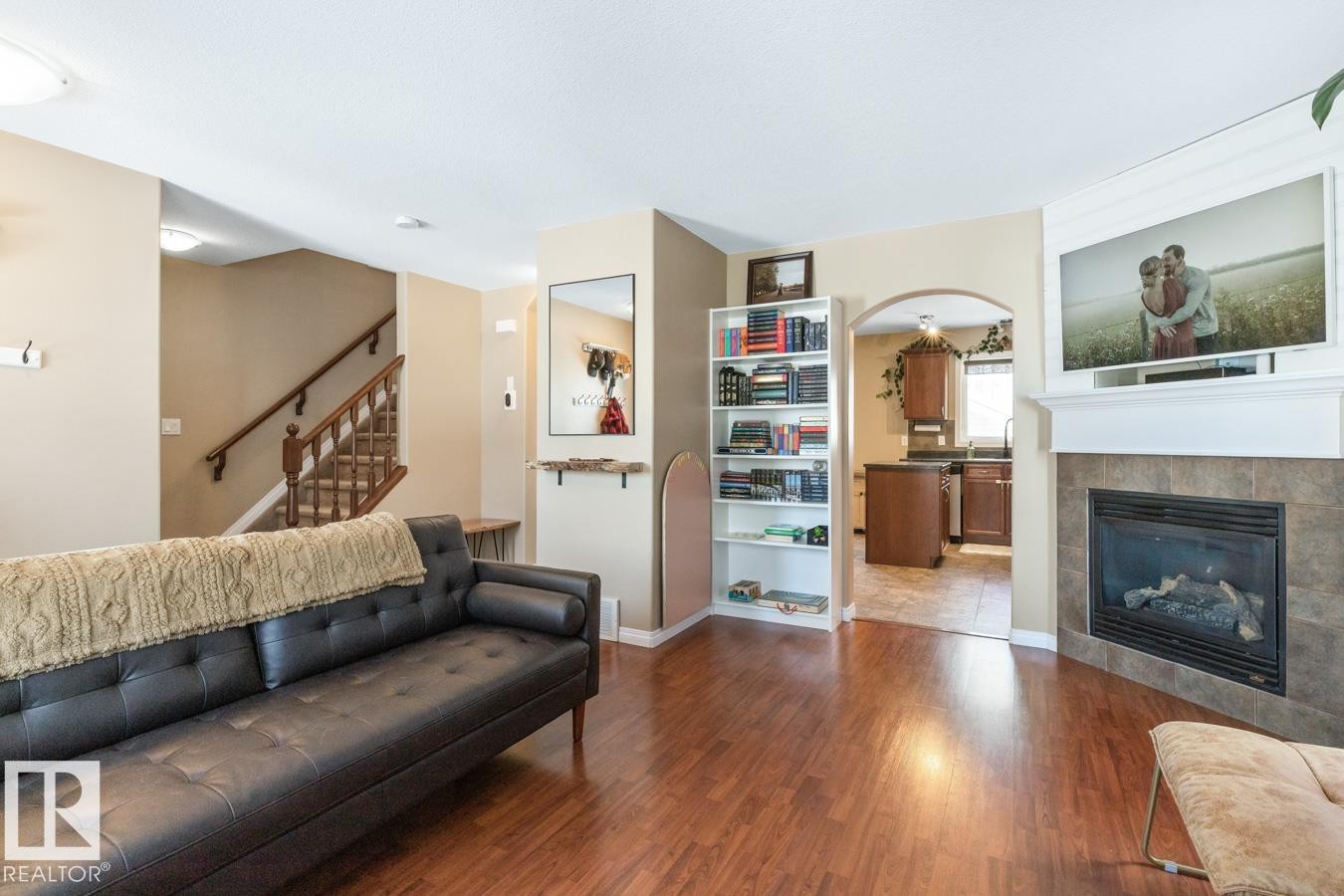 3820 53 Street, Gibbons, AB - Indoor Photo Showing Living Room With Fireplace