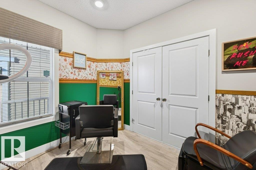Flex room near the front foyer - perfect for an additional bedroom or home-based business. - 1909 Davidson Wynd, Edmonton, AB - Indoor Photo Showing Other Room