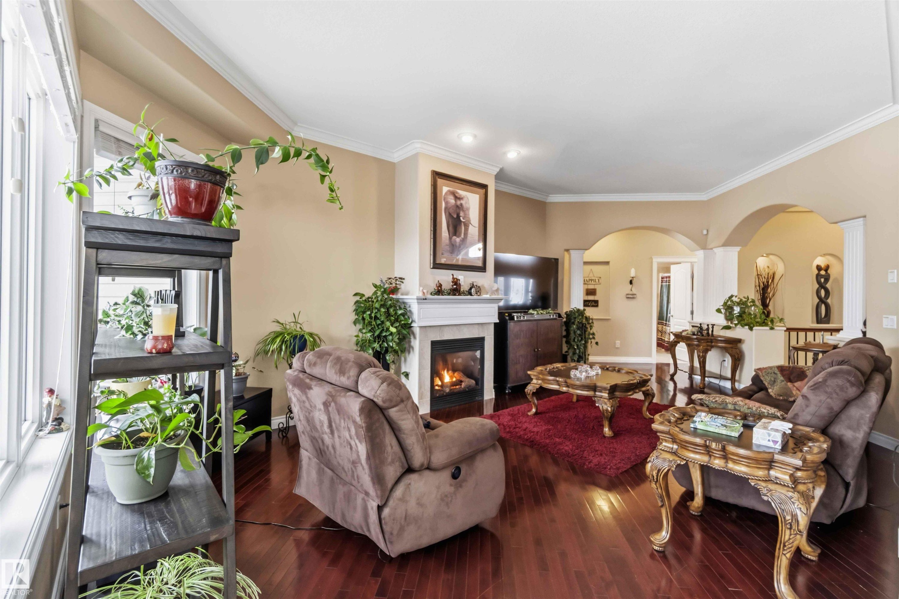 40 Landing Trails Drive, Gibbons, AB - Indoor Photo Showing Living Room With Fireplace
