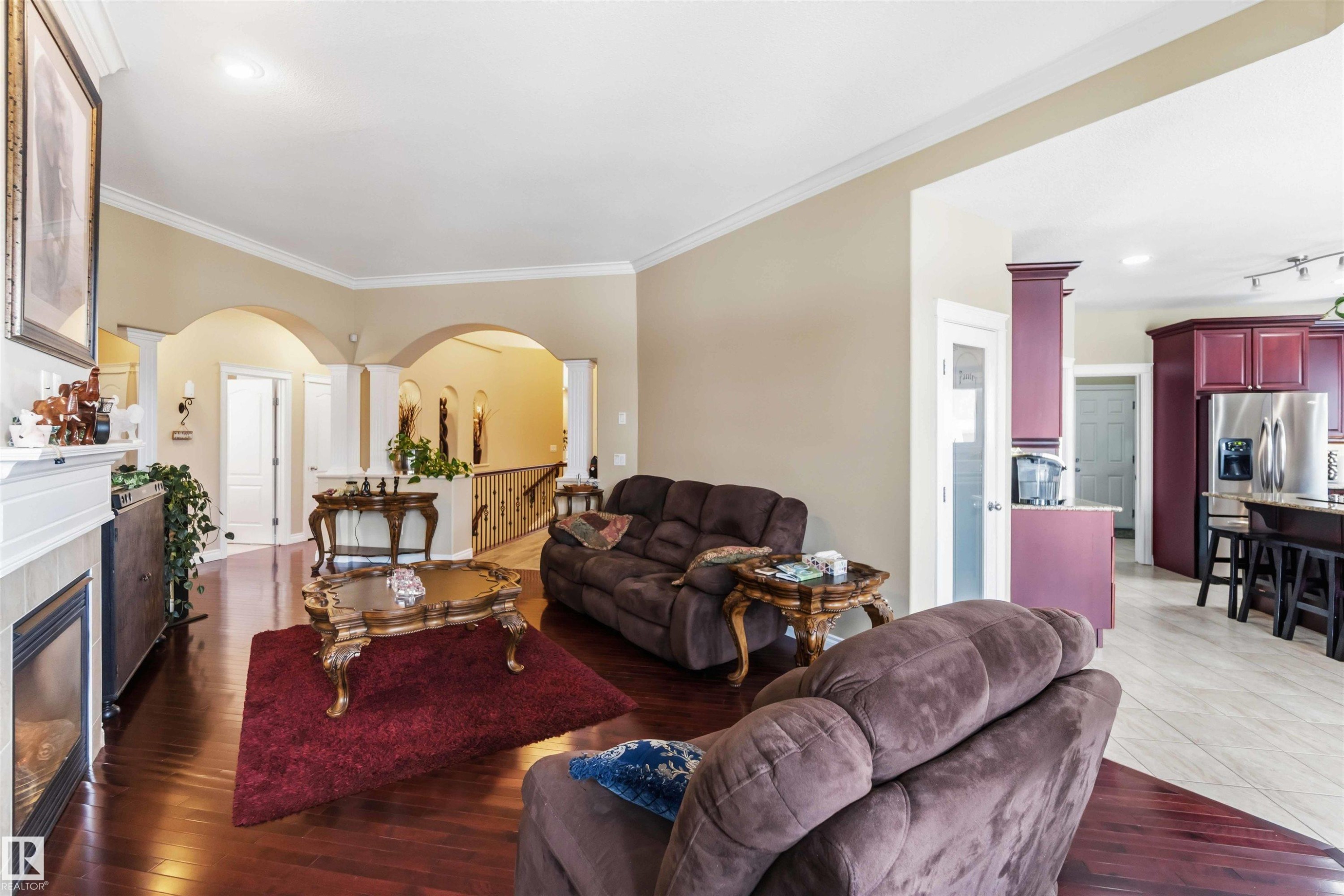 40 Landing Trails Drive, Gibbons, AB - Indoor Photo Showing Living Room With Fireplace