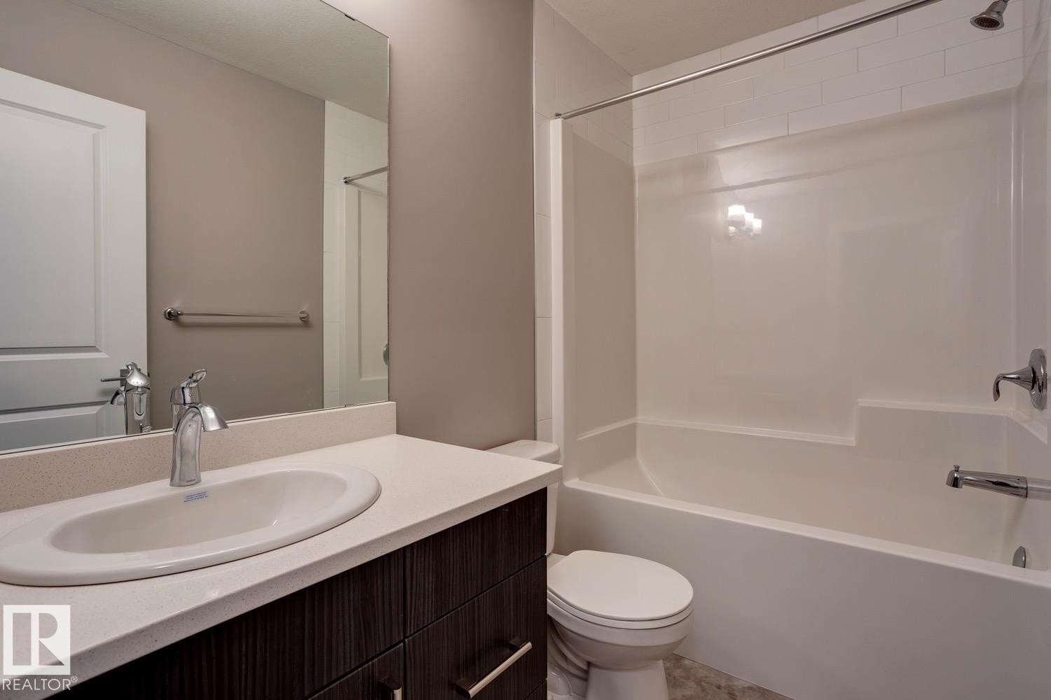 Bathroom with vanity and shower combination - 78 13139 205 Street Nw, Edmonton, AB - Indoor Photo Showing Bathroom