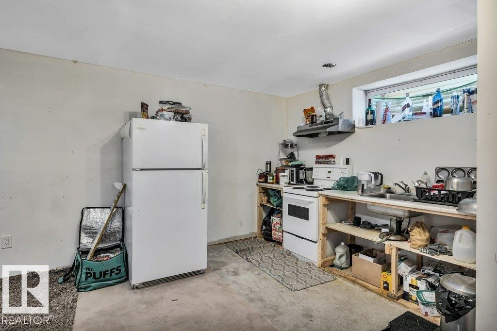2920 30 Street, Edmonton, AB - Indoor Photo Showing Kitchen With Double Sink