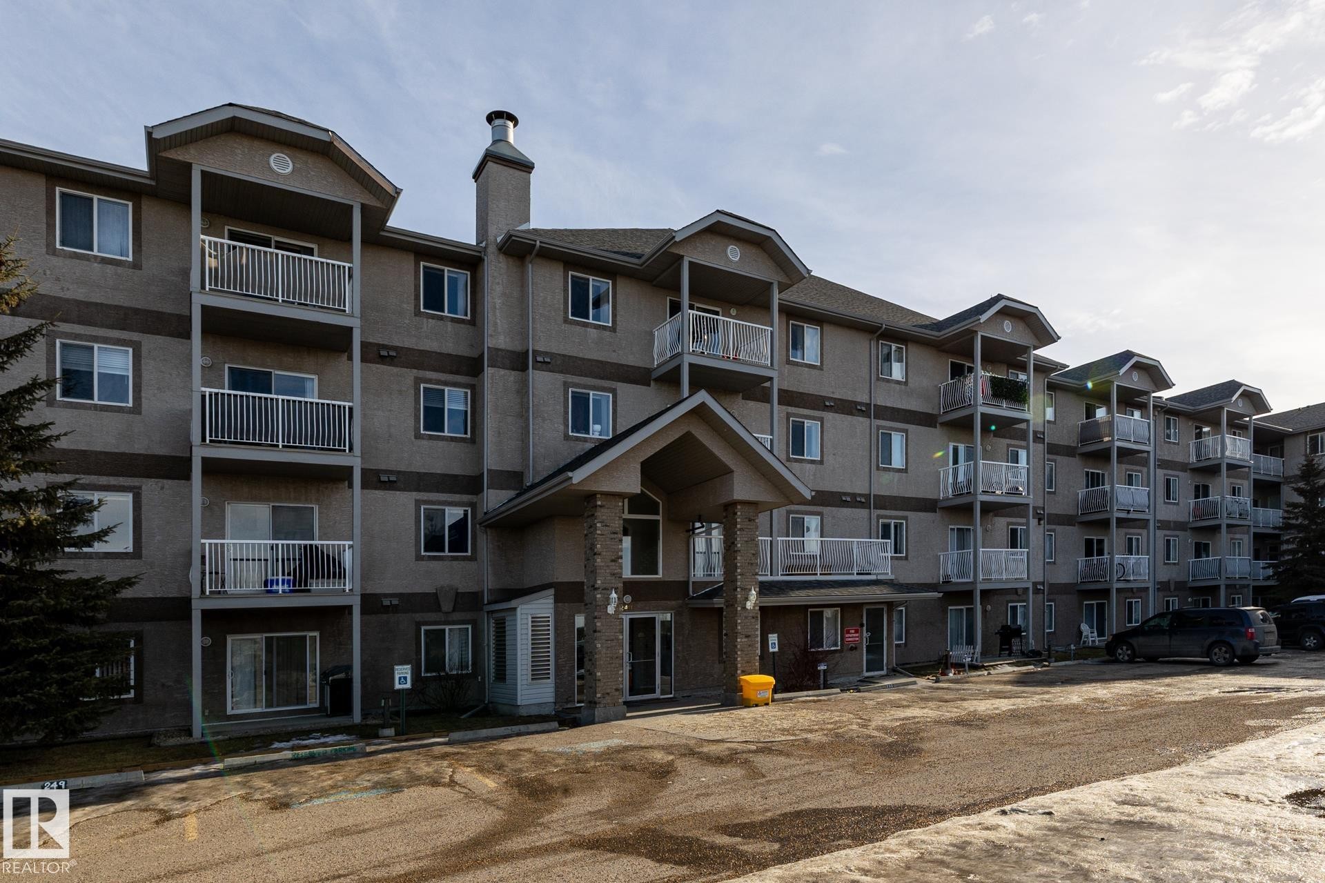 317 240 Spruce Ridge Road, Spruce Grove, AB - Outdoor With Balcony With Facade