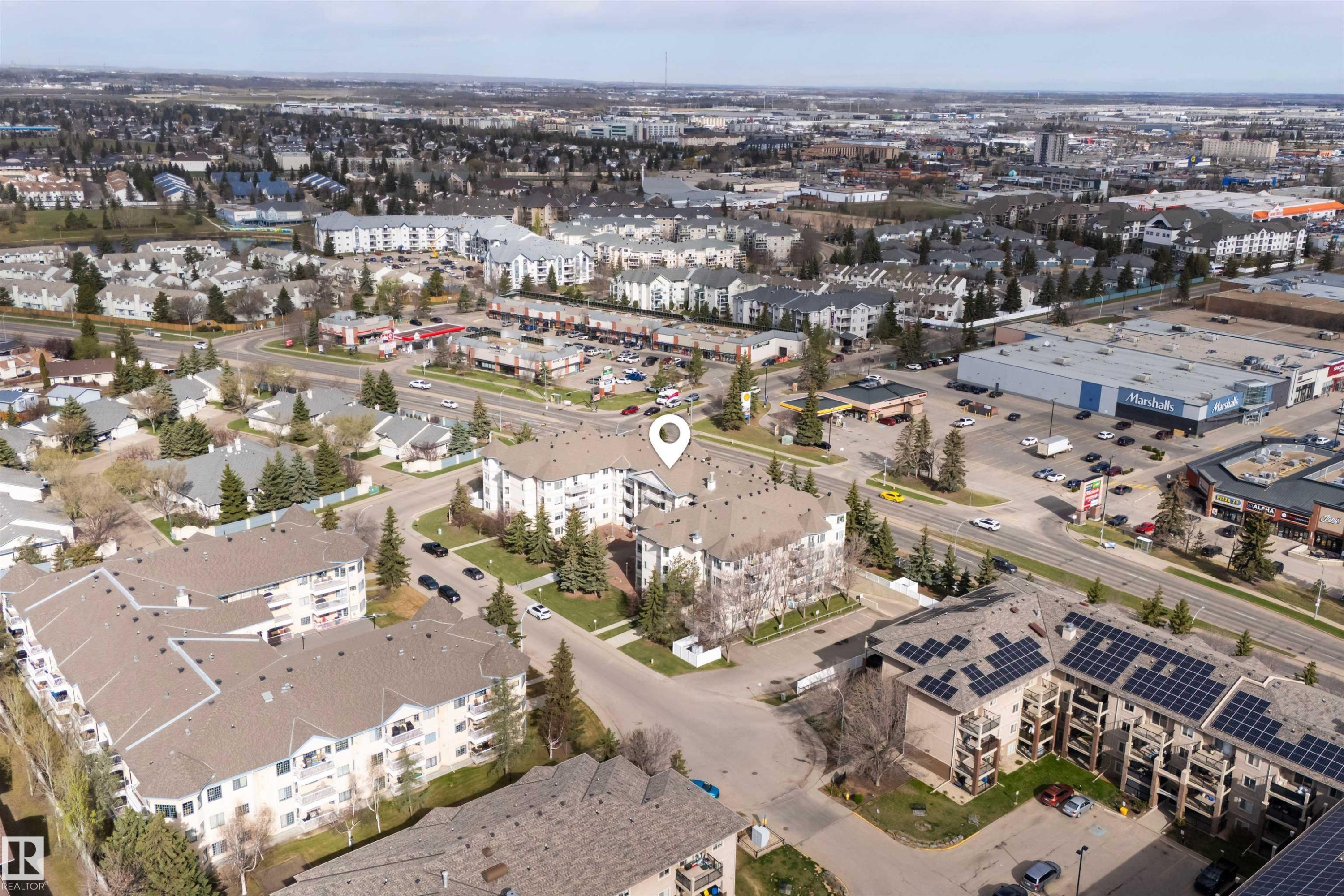 Aerial overview of property's location featuring nearby urban area - 209 17150 94A Avenue, Edmonton, AB - Outdoor With View