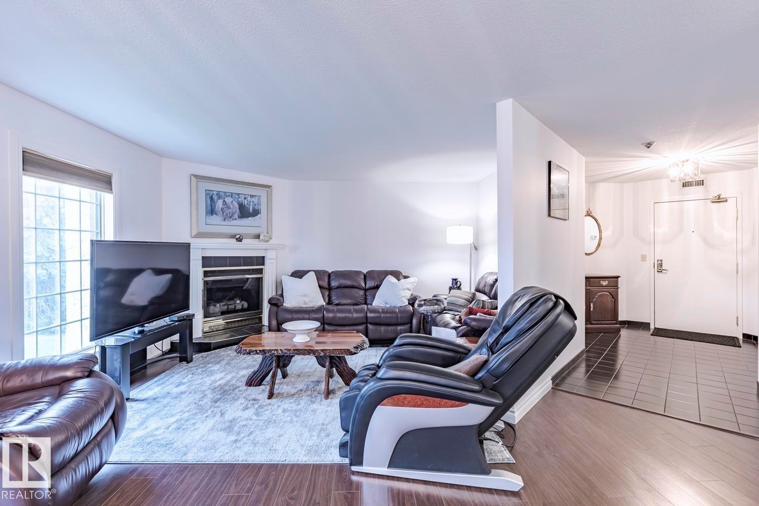 516 3 Perron Street, St. Albert, AB - Indoor Photo Showing Living Room With Fireplace