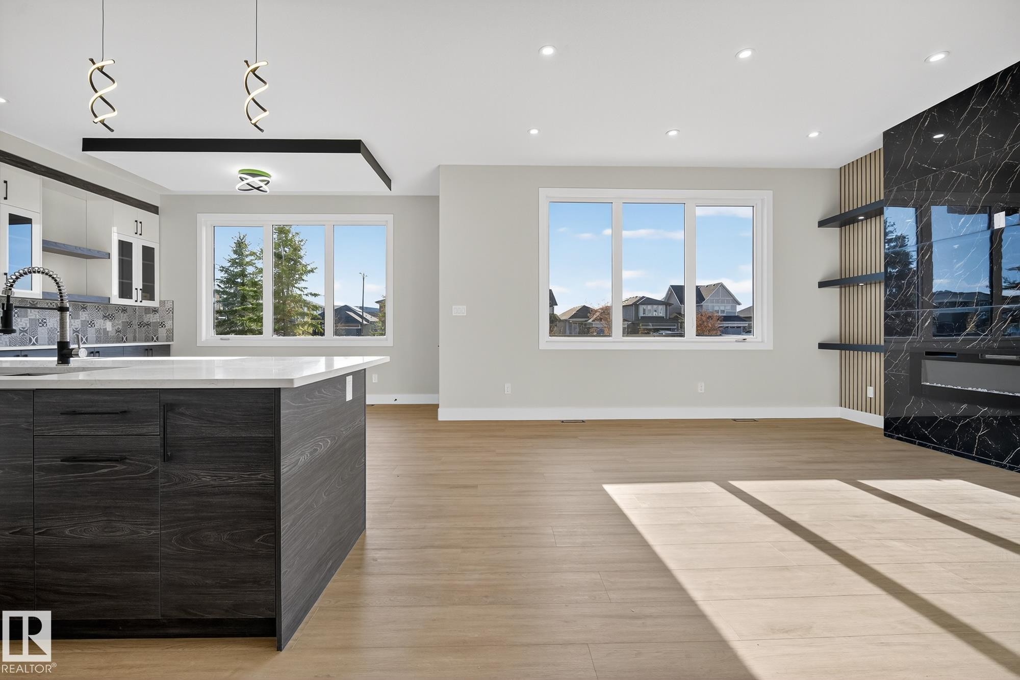 181 Edgewater Circle, Leduc, AB - Indoor Photo Showing Other Room With Fireplace