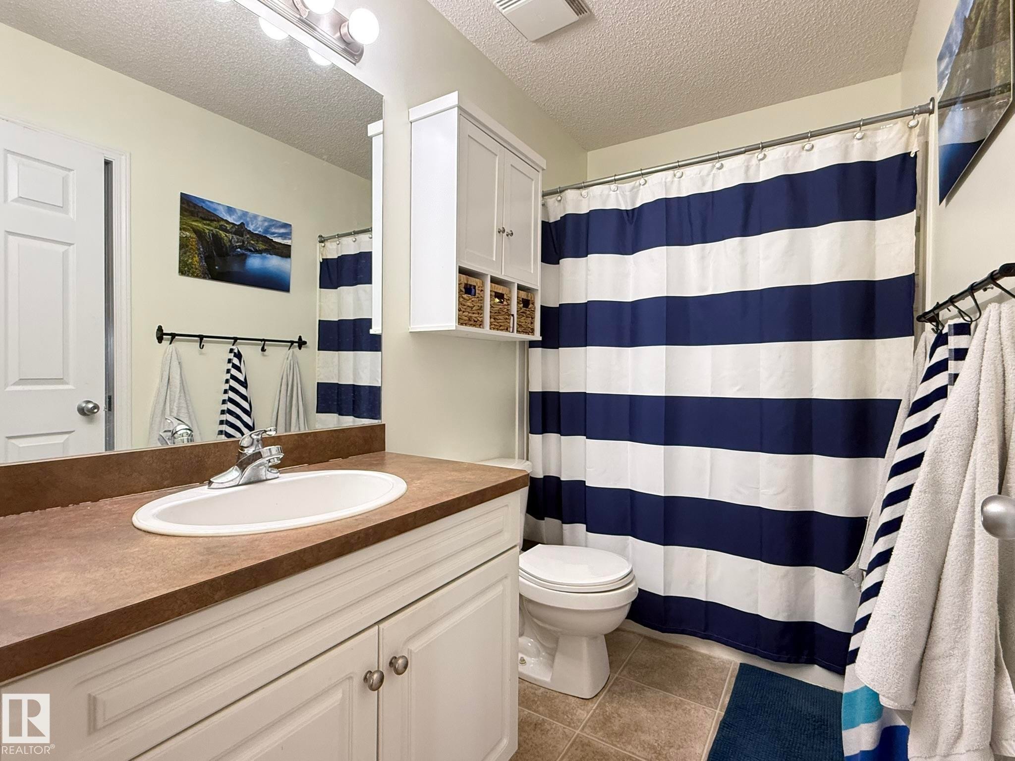 735 Kananaskis Drive, Devon, AB - Indoor Photo Showing Bathroom