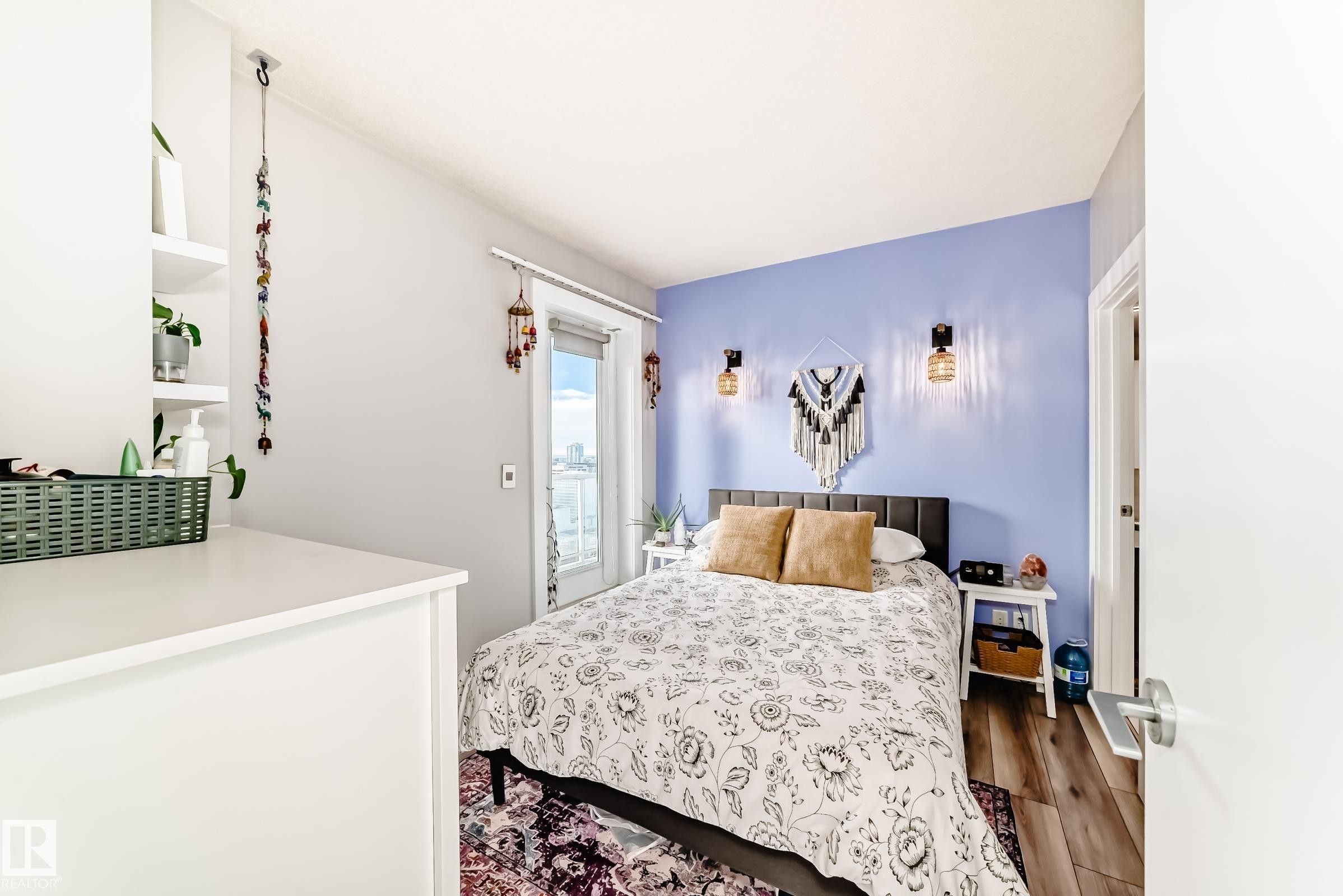 Bedroom with wood finished floors - 2004 10136 104 Street, Edmonton, AB - Indoor Photo Showing Bedroom