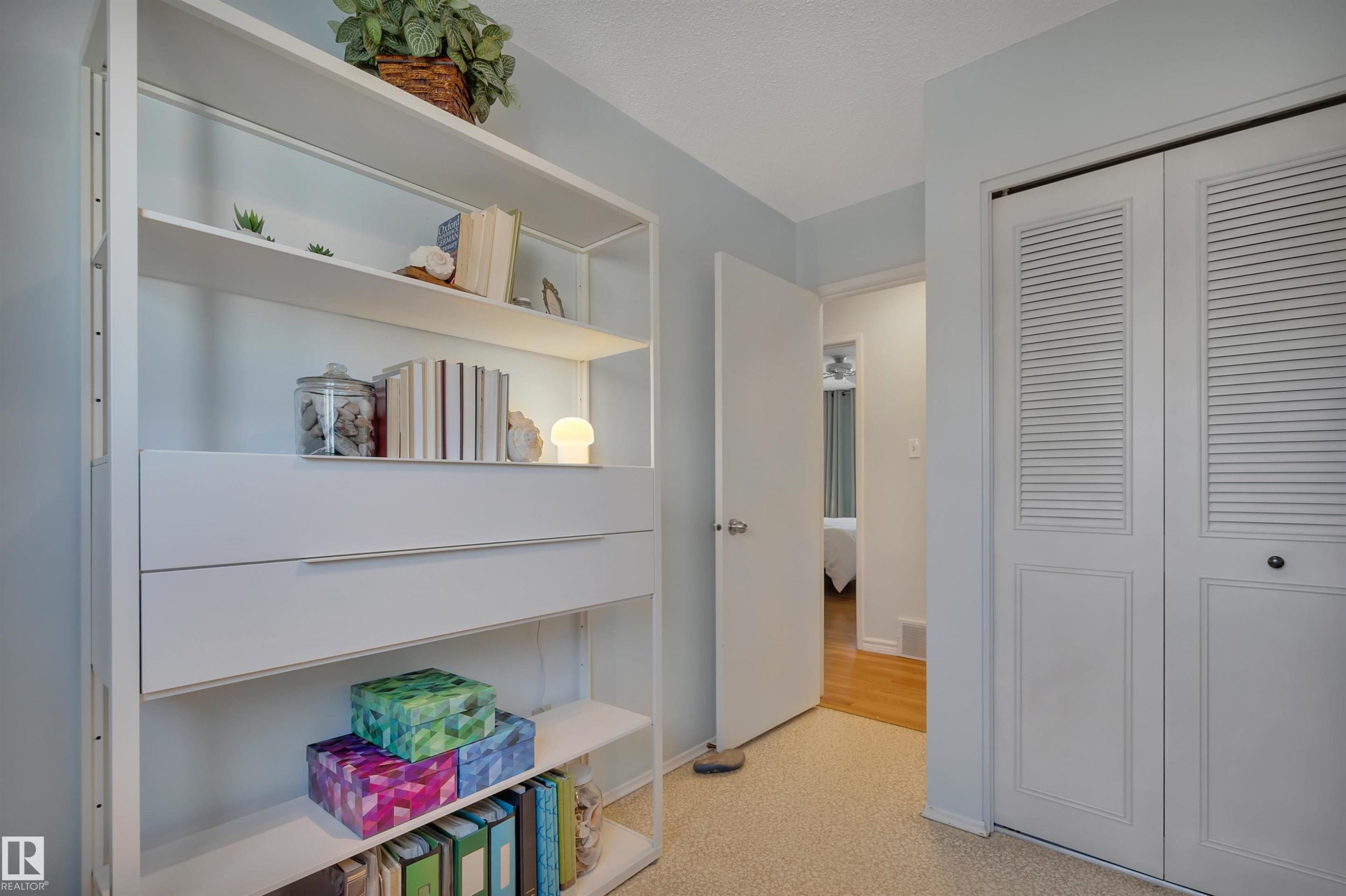 Hall with baseboards - 7075 32 Avenue, Edmonton, AB - Indoor Photo Showing Other Room
