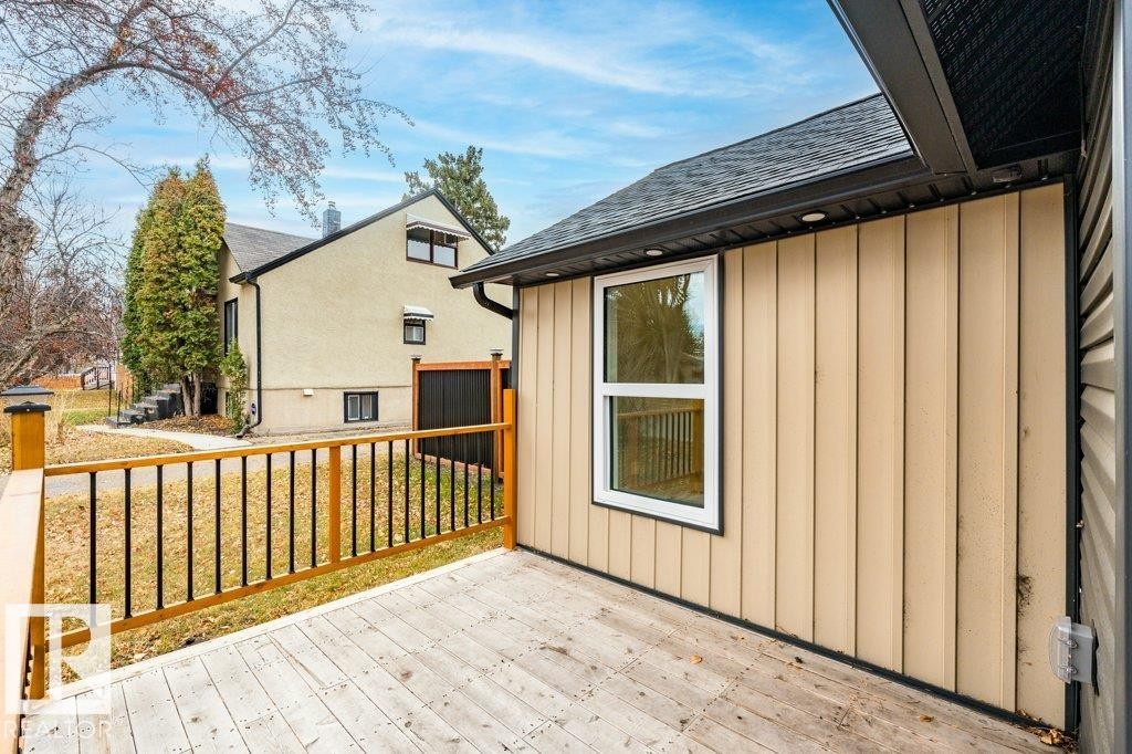 Wooden deck featuring a yard - 4713 48 Avenue, Wetaskiwin, AB - Outdoor With Deck Patio Veranda With Exterior