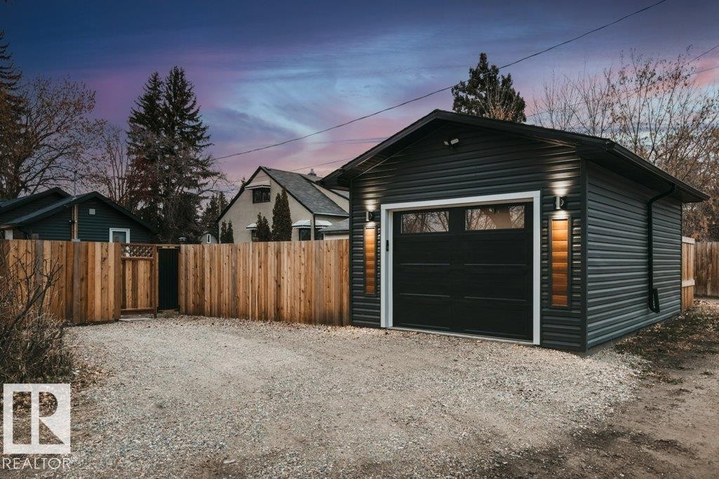 Detached garage featuring driveway - 4713 48 Avenue, Wetaskiwin, AB - Outdoor