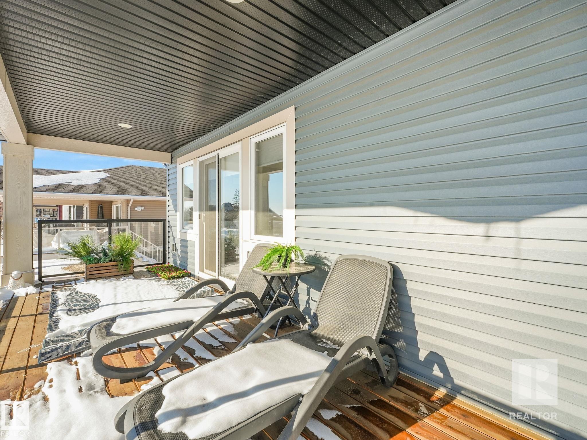 View of wooden terrace - 209 55101 Ste. Anne Trail, Rural Lac Ste. Anne County, AB - Outdoor With Exterior