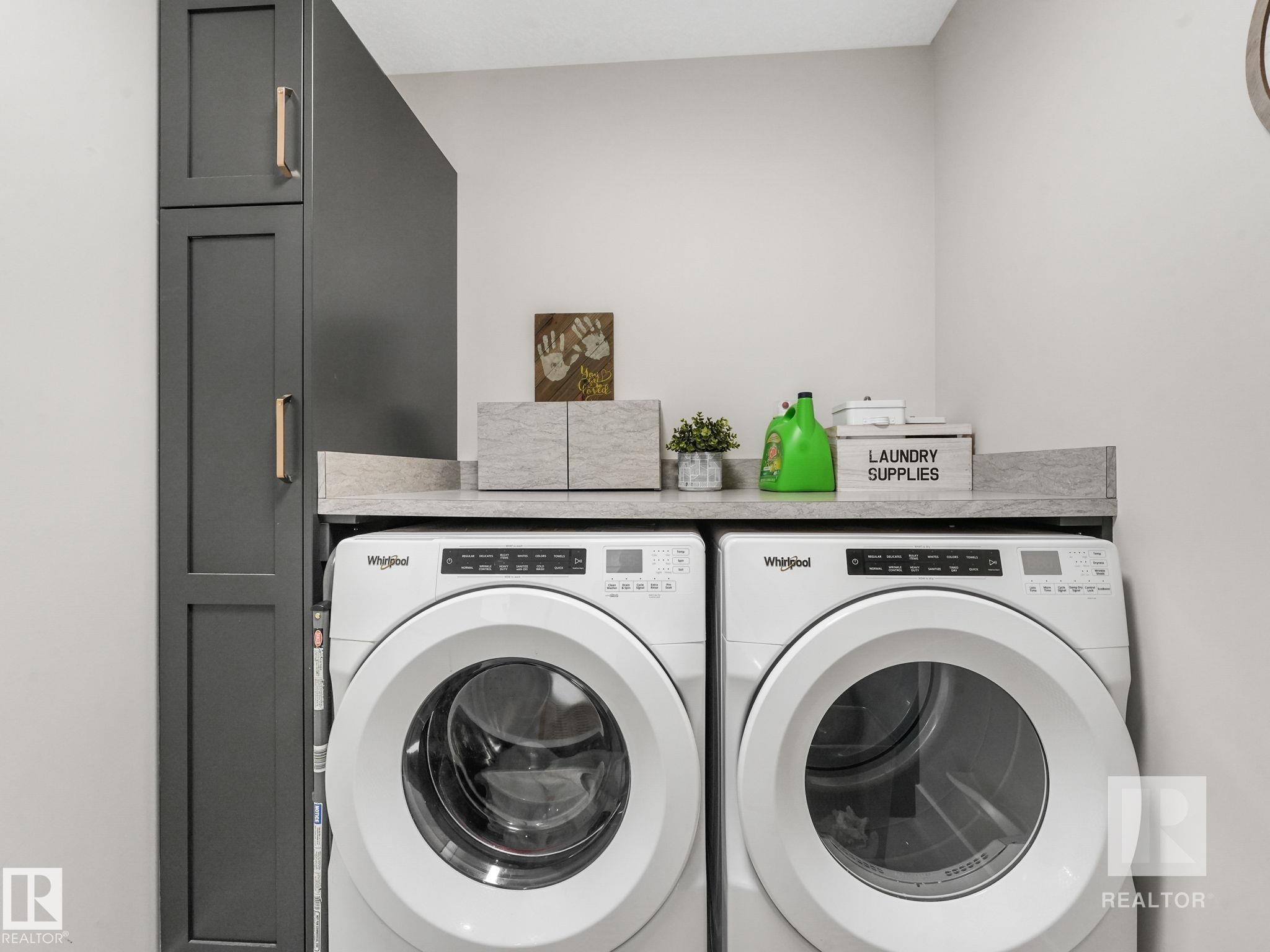 Laundry room featuring separate washer and dryer - 209 55101 Ste. Anne Trail, Rural Lac Ste. Anne County, AB - Indoor Photo Showing Laundry Room