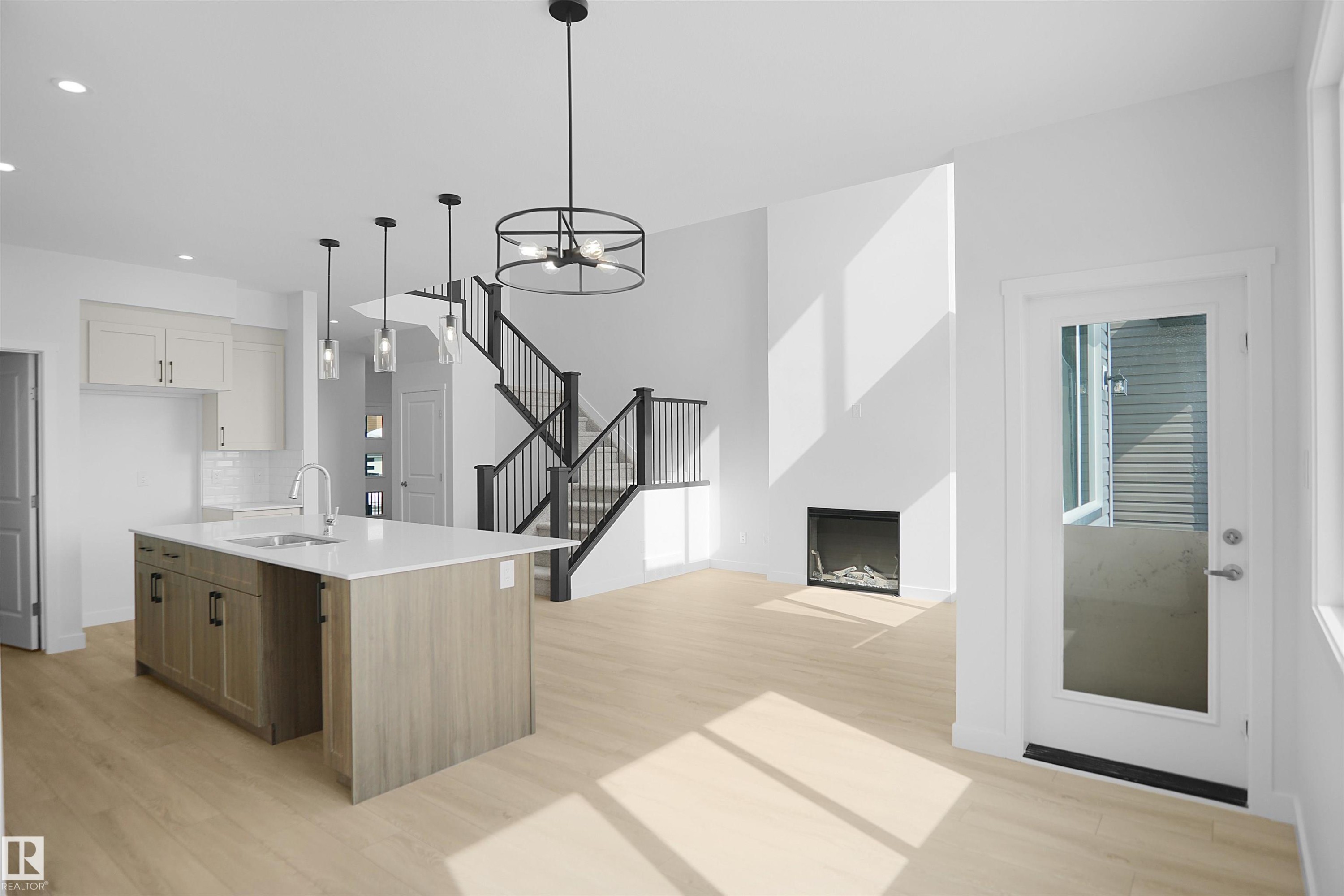 7239 182 Avenue, Edmonton, AB - Indoor Photo Showing Kitchen With Fireplace