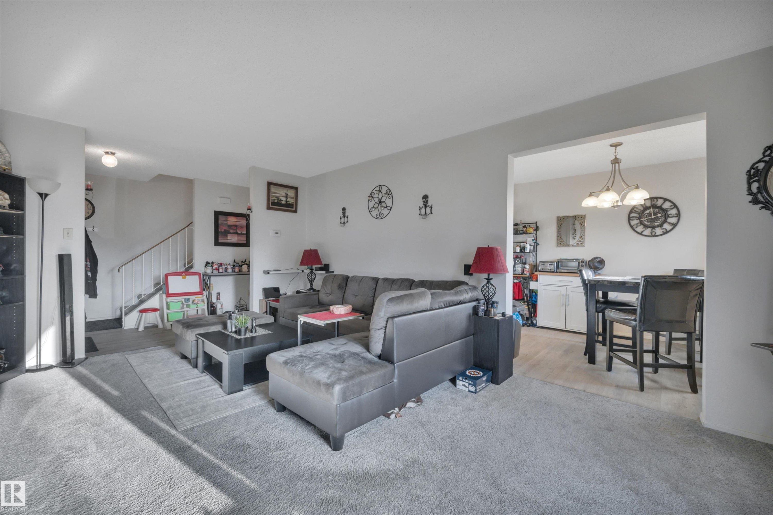 8216-8222 120 Avenue, Edmonton, AB - Indoor Photo Showing Living Room