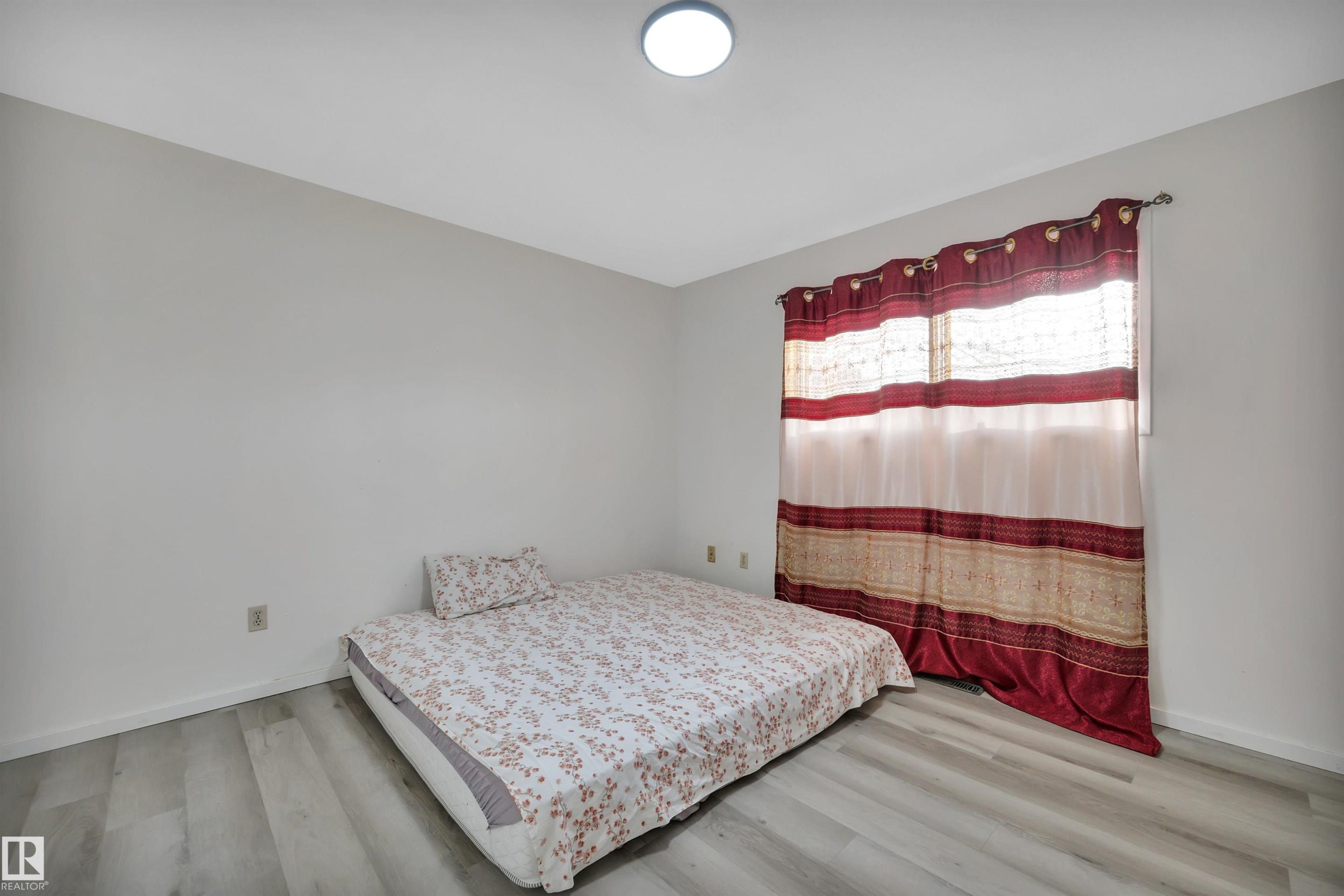 8216-8222 120 Avenue, Edmonton, AB - Indoor Photo Showing Bedroom