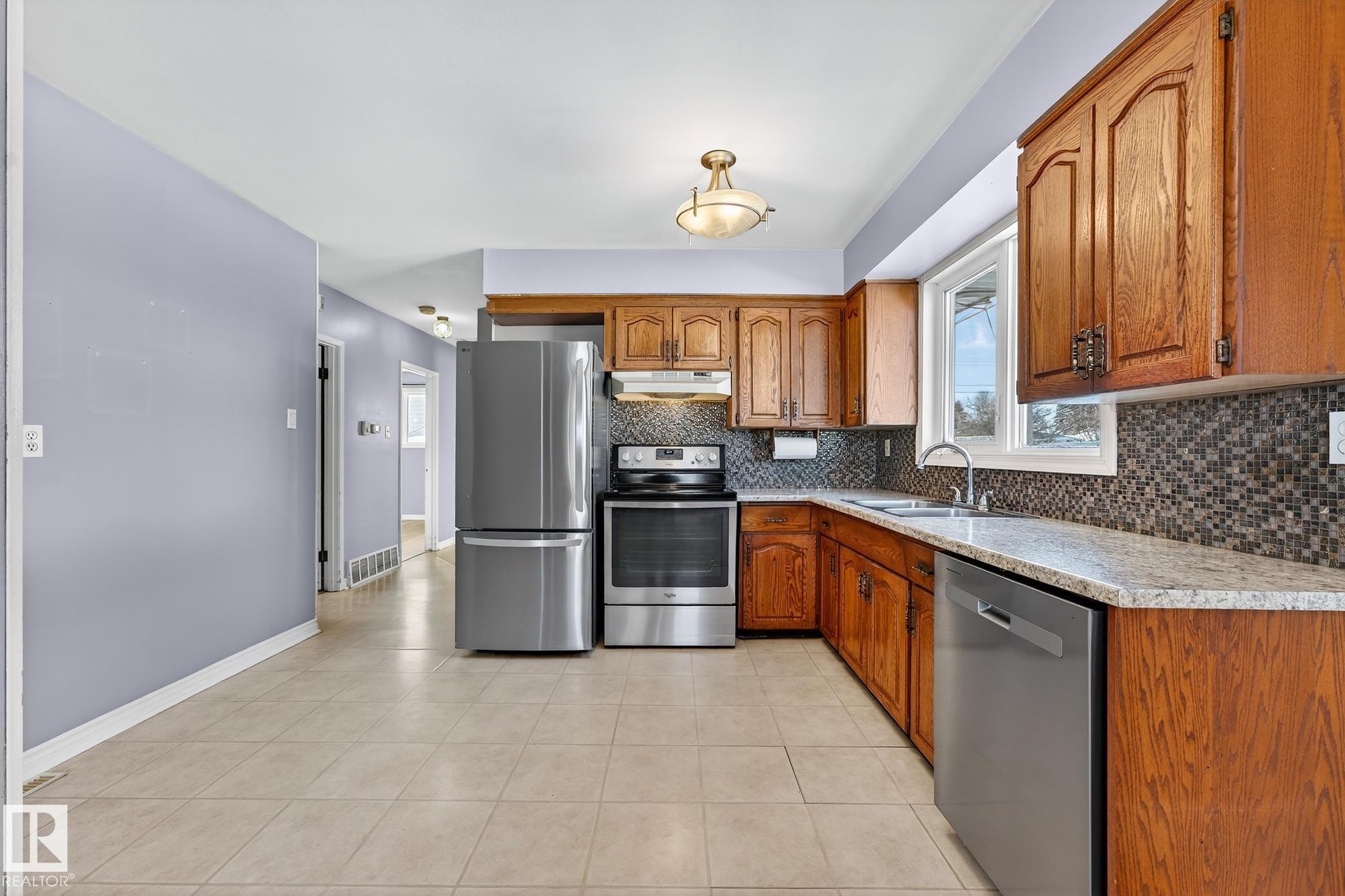 4645 115 Avenue, Edmonton, AB - Indoor Photo Showing Kitchen With Stainless Steel Kitchen With Double Sink