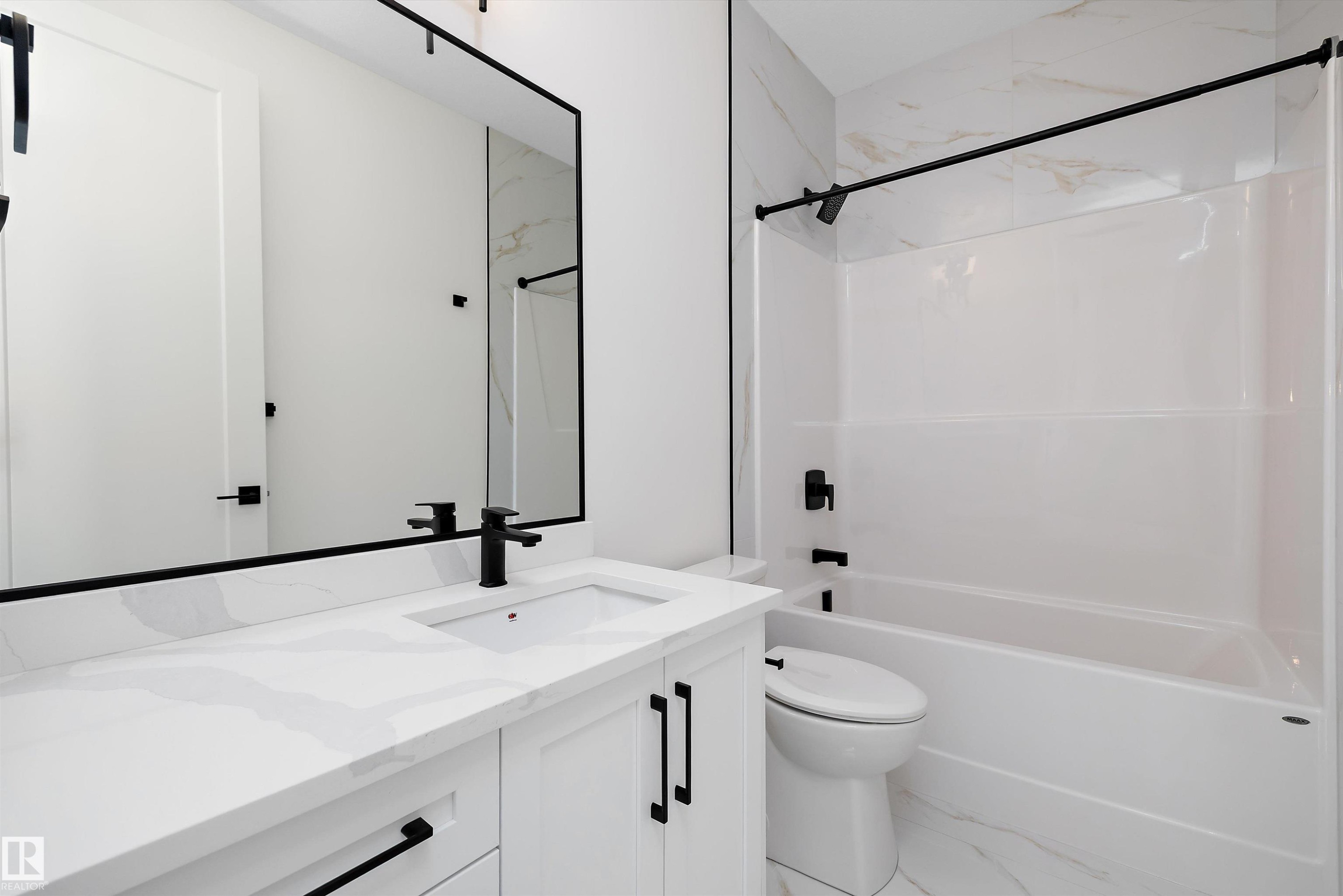 Bathroom with vanity, light marble finish flooring, and tub / shower combination - 6871 Knox Loop Sw, Edmonton, AB - Indoor Photo Showing Bathroom
