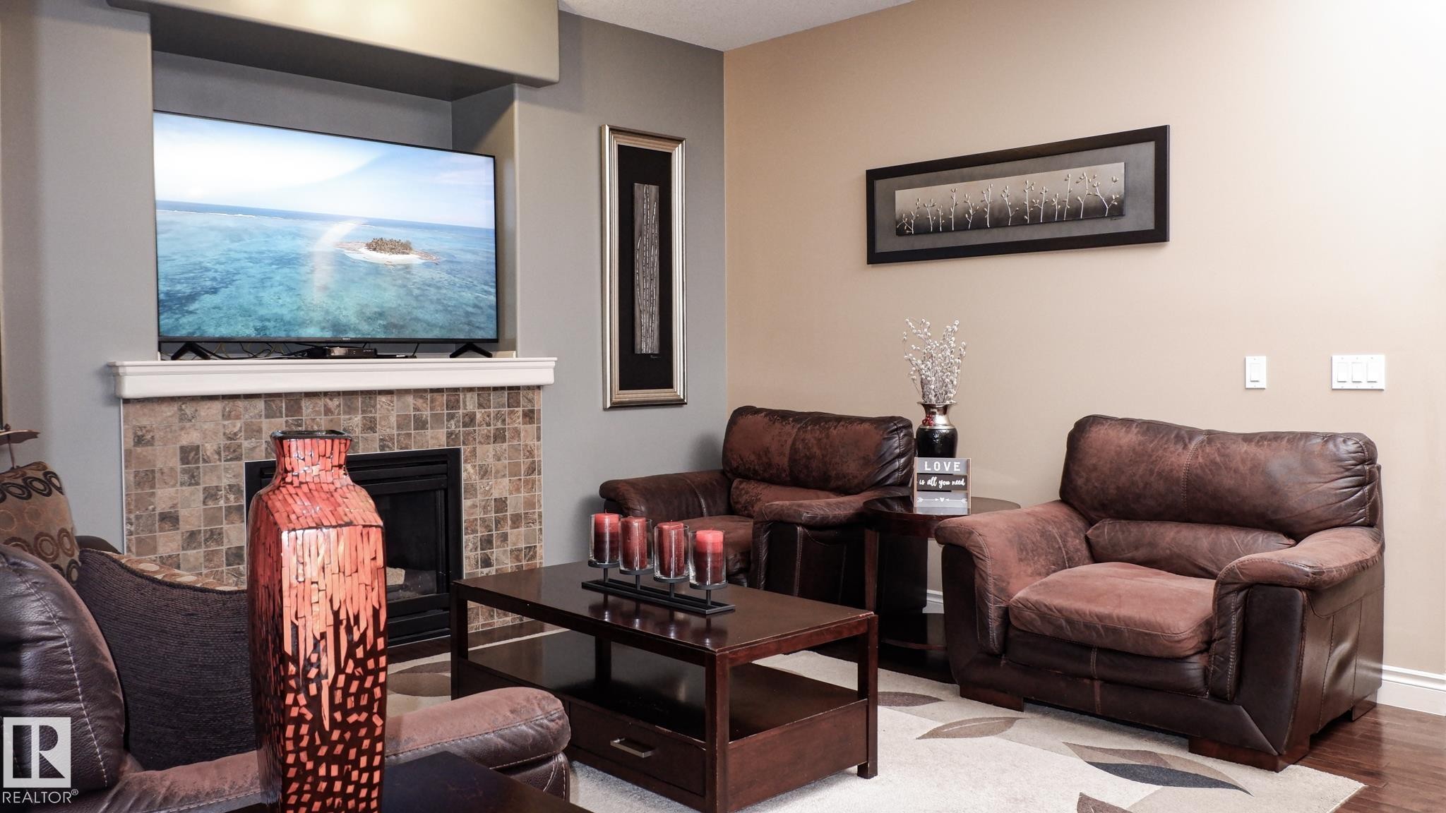 3619 Goodridge Crescent, Edmonton, AB - Indoor Photo Showing Living Room With Fireplace