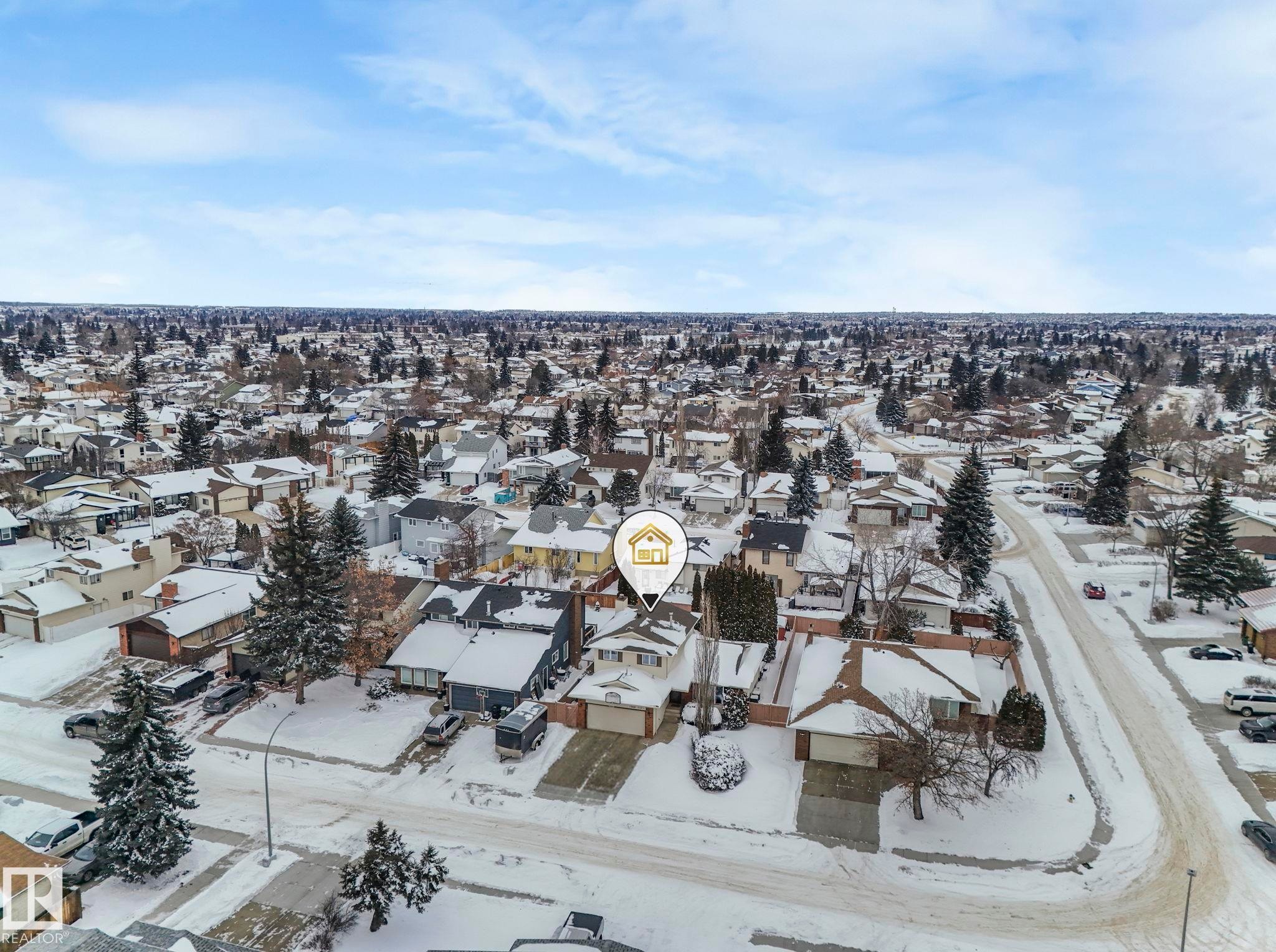 Snowy aerial view featuring a residential view - 15909 112 B Street Nw, Edmonton, AB - Outdoor With View