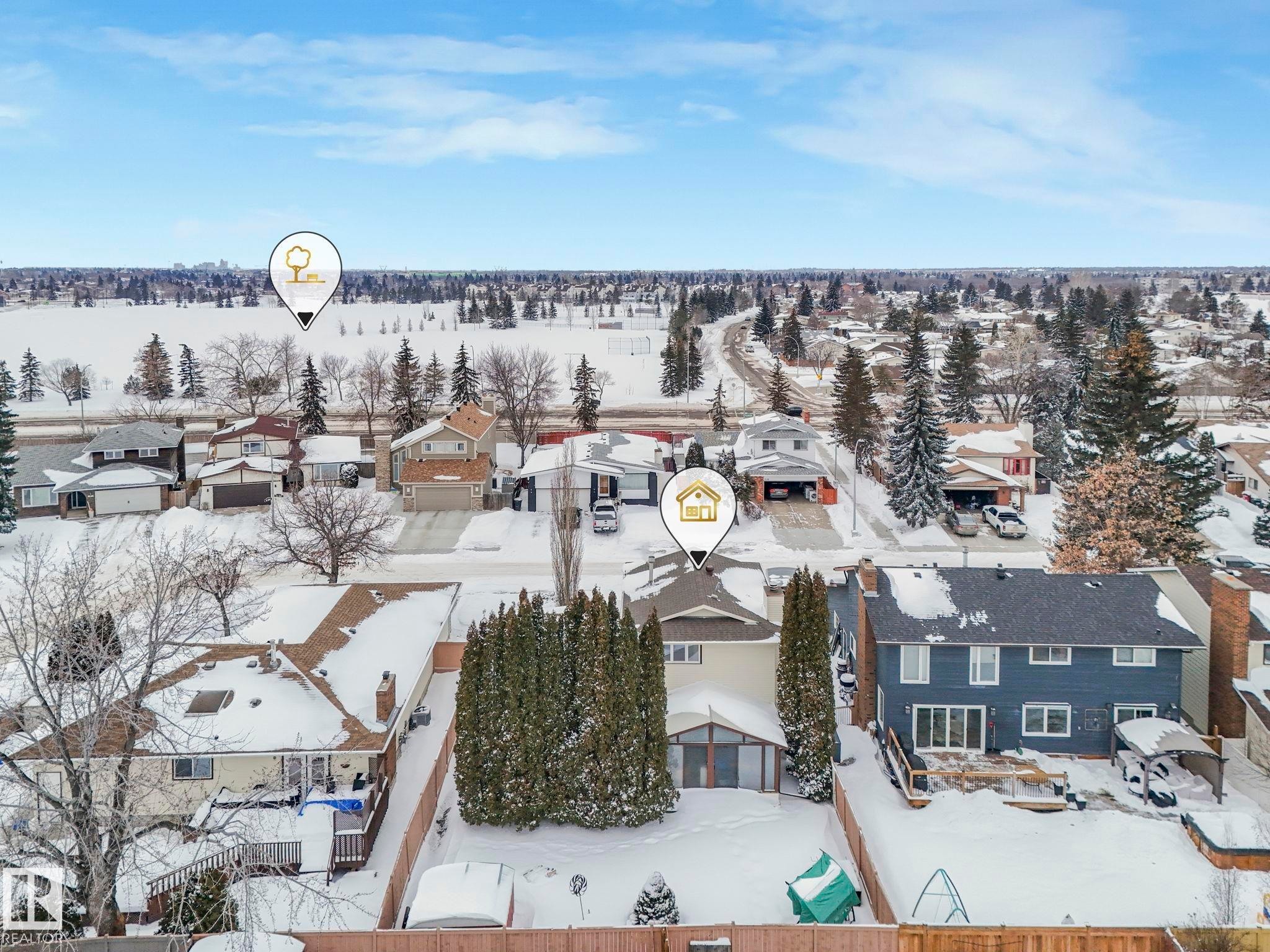 Snowy aerial view with a residential view - 15909 112 B Street Nw, Edmonton, AB - Outdoor With View