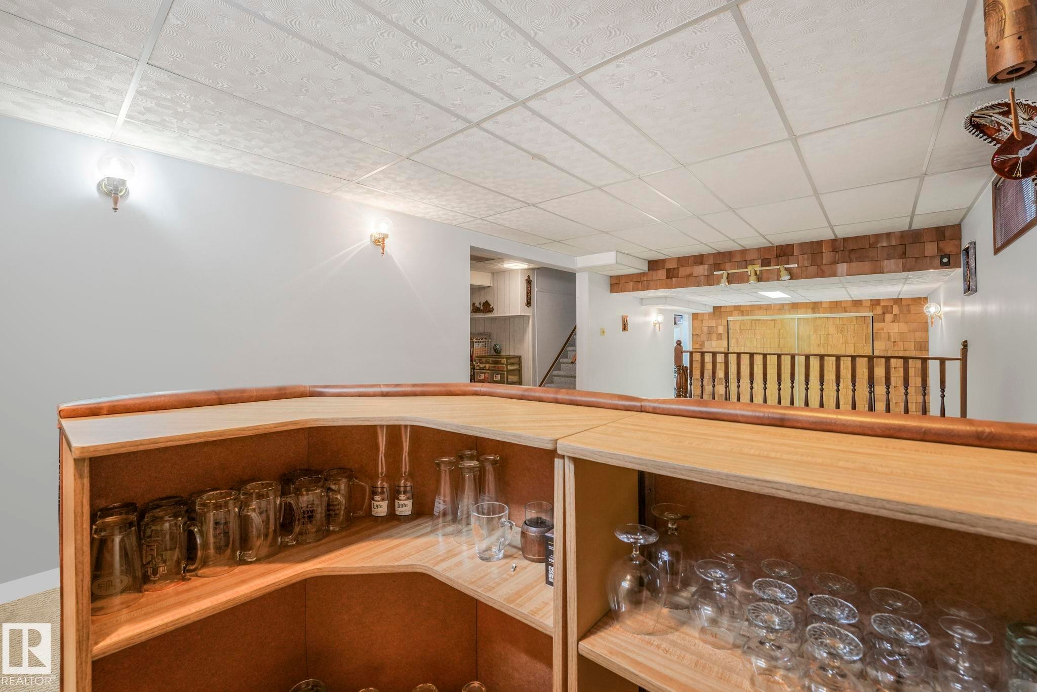 Staircase featuring a drop ceiling - 15909 112 B Street Nw, Edmonton, AB - Indoor Photo Showing Other Room