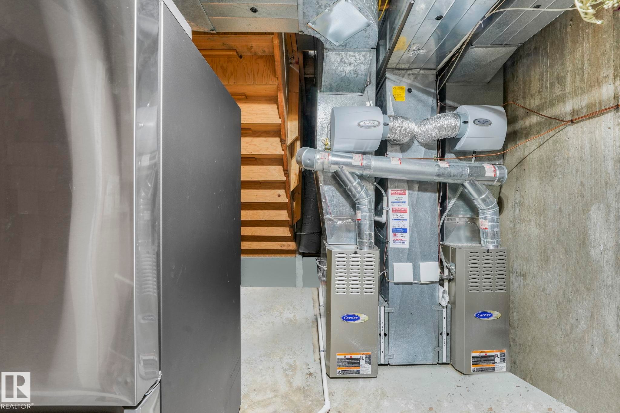 Utility room with heating unit - 15909 112 B Street Nw, Edmonton, AB - Indoor Photo Showing Basement