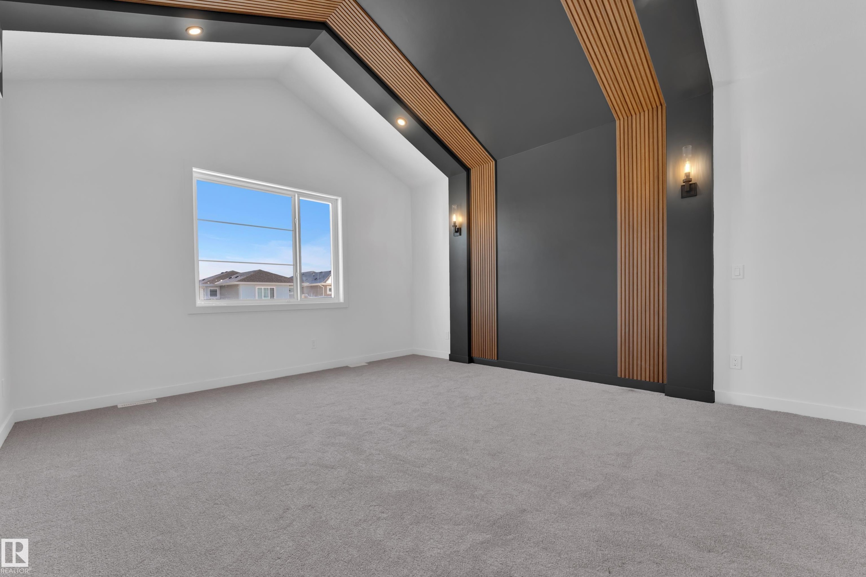 Unfurnished room featuring lofted ceiling, carpet floors, and recessed lighting - 95 Eldridge Point(E), St. Albert, AB - Indoor Photo Showing Other Room