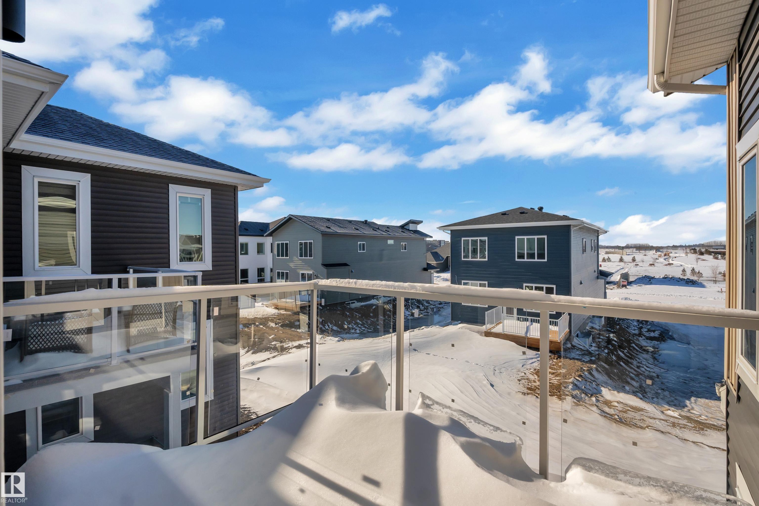 Snow covered back of property with a residential view - 95 Eldridge Point(E), St. Albert, AB - Outdoor