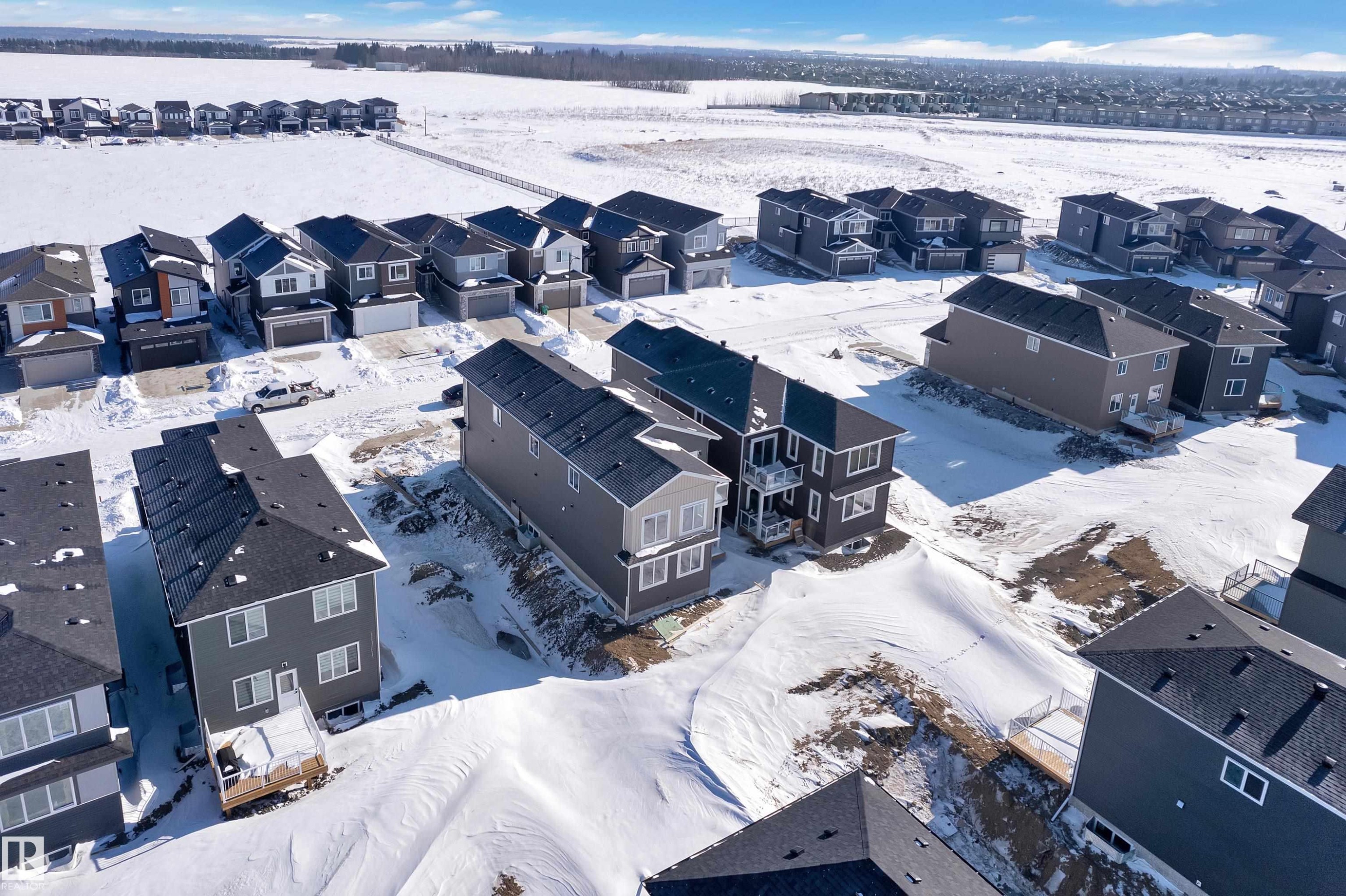 Snowy aerial view with a residential view - 95 Eldridge Point(E), St. Albert, AB - Outdoor With View