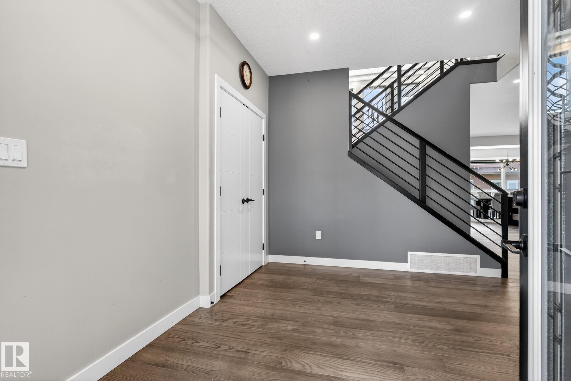 Entryway with dark wood-style floors, ceiling fan, and recessed lighting - 1027 150 Avenue, Edmonton, AB - Indoor Photo Showing Other Room