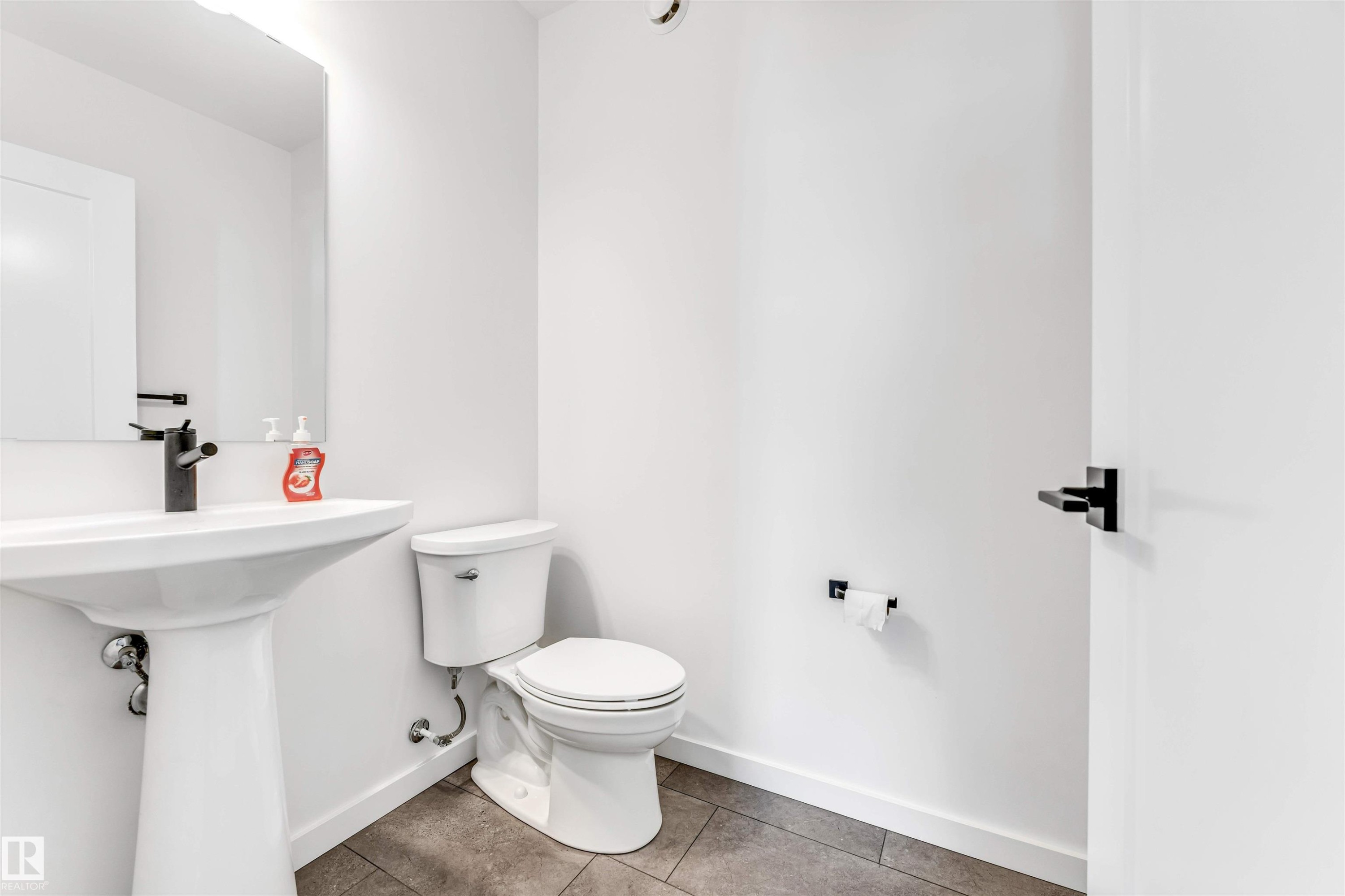 Bathroom with baseboards and tile patterned floors - 77 5 Rondeau Drive, St. Albert, AB - Indoor Photo Showing Bathroom