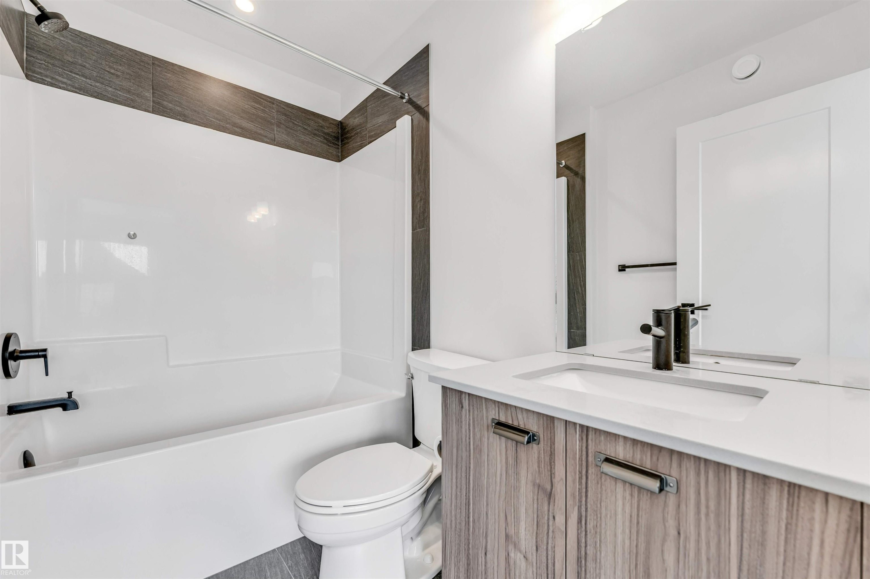 Full bath with vanity and shower combination - 77 5 Rondeau Drive, St. Albert, AB - Indoor Photo Showing Bathroom