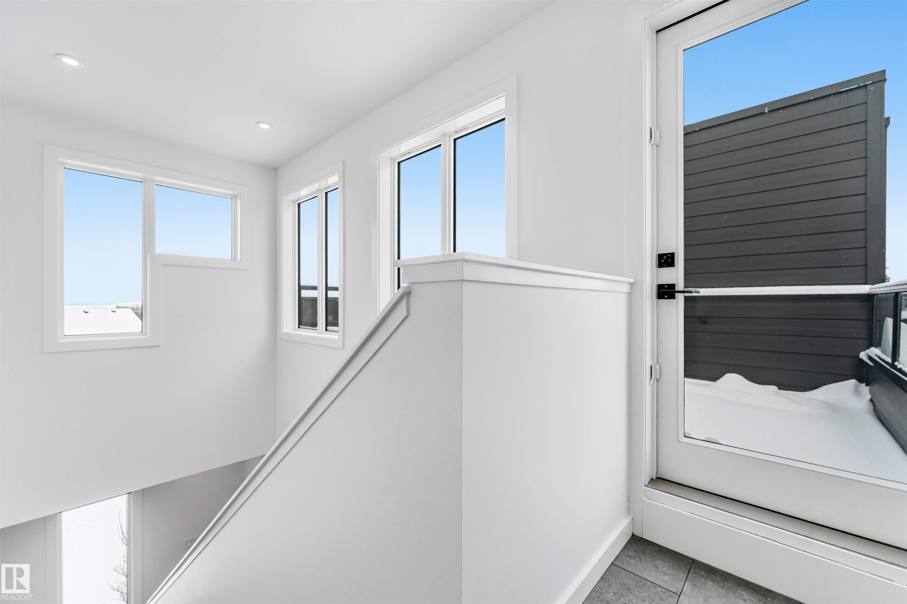 Interior space with recessed lighting and tile patterned floors - 77 5 Rondeau Drive, St. Albert, AB - Indoor Photo Showing Other Room