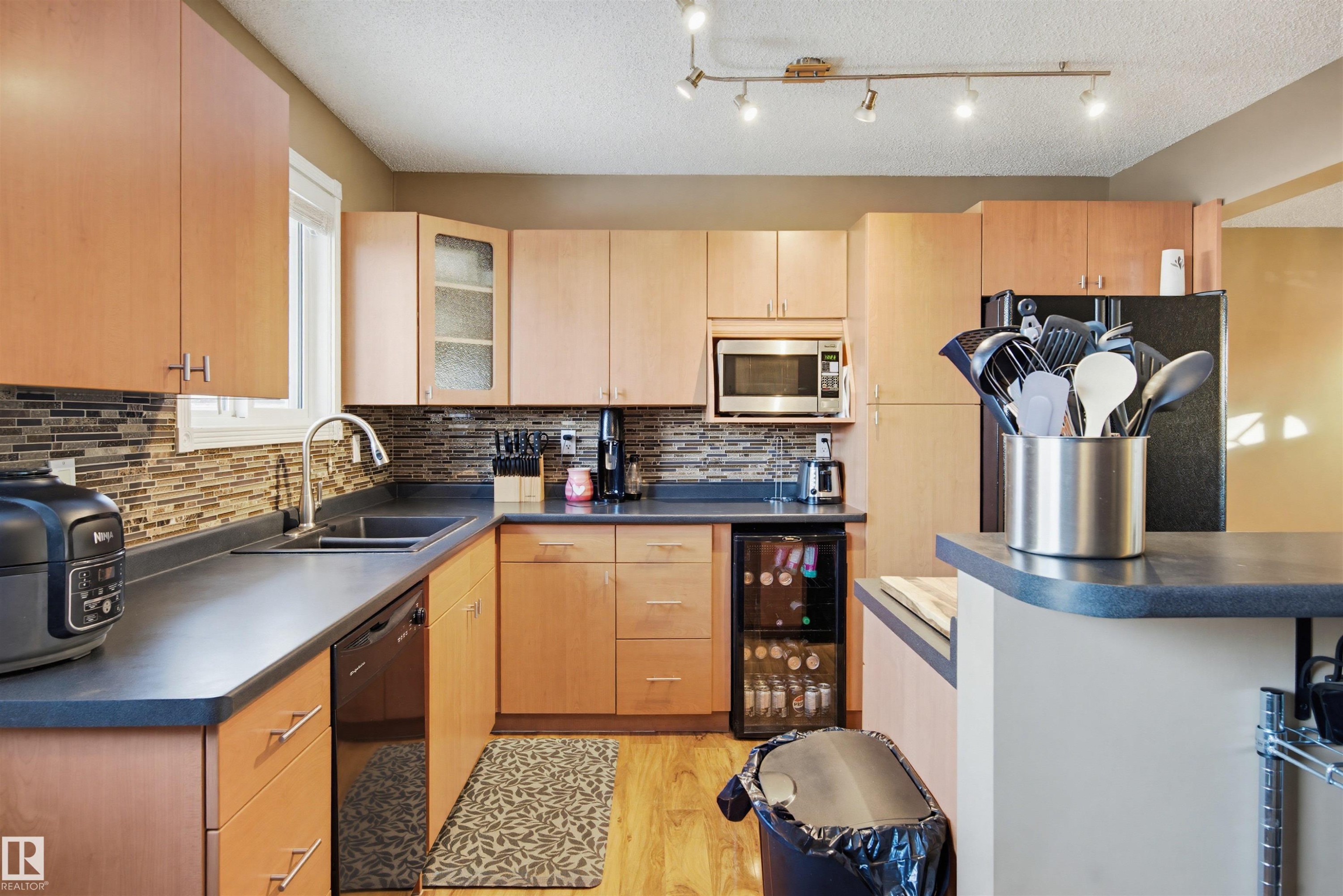 3426 120 Avenue, Edmonton, AB - Indoor Photo Showing Kitchen With Double Sink
