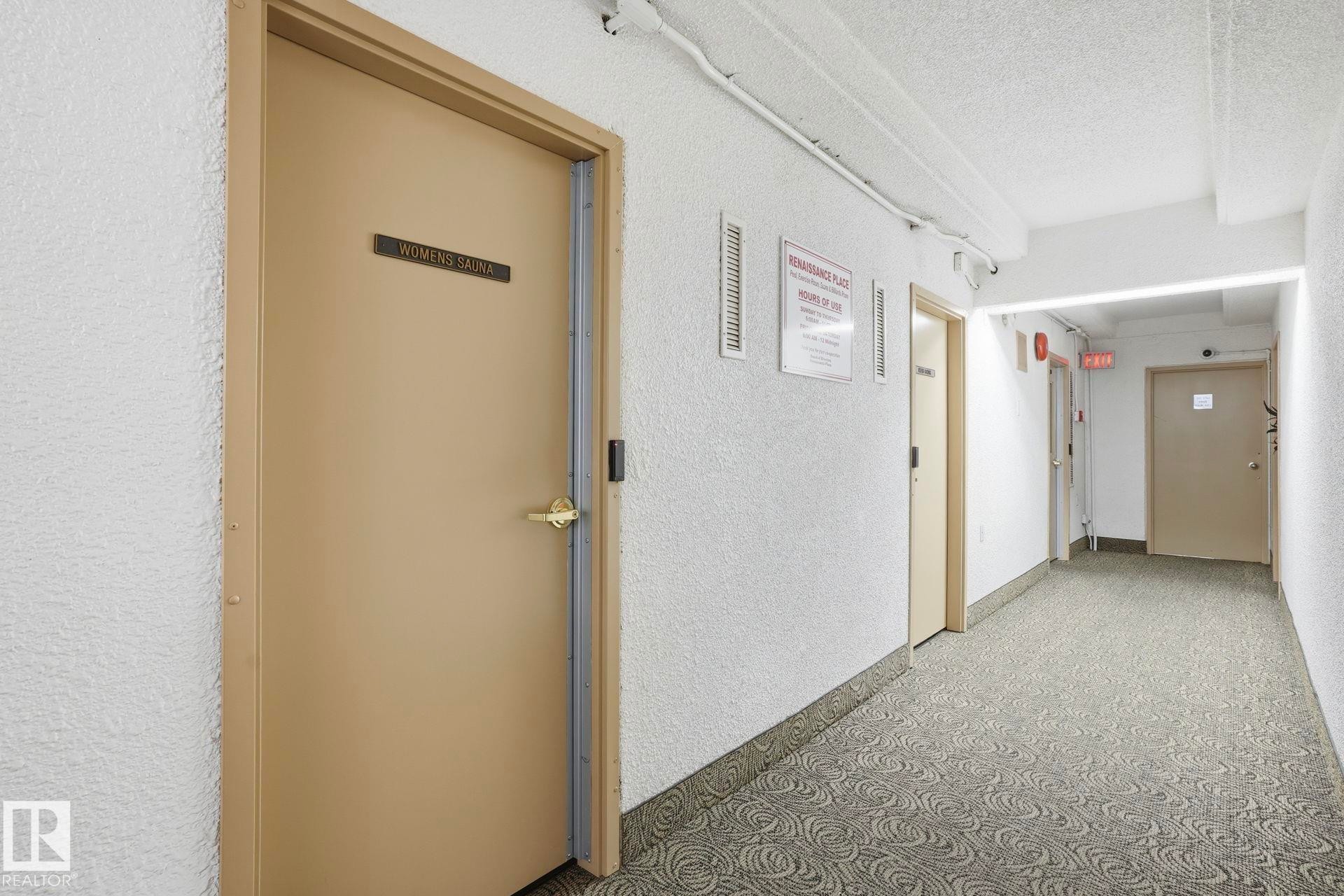 Hall featuring a textured wall and a textured ceiling - 1103 9918 101 Street, Edmonton, AB - Indoor Photo Showing Other Room