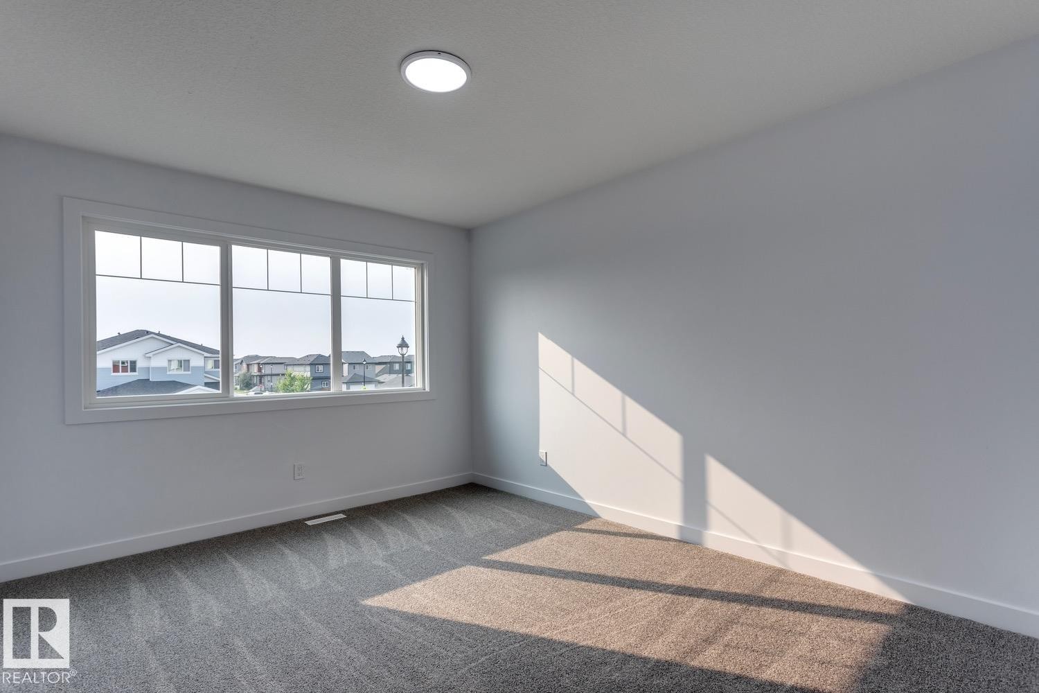 35 Caledon Crescent, Spruce Grove, AB - Indoor Photo Showing Other Room