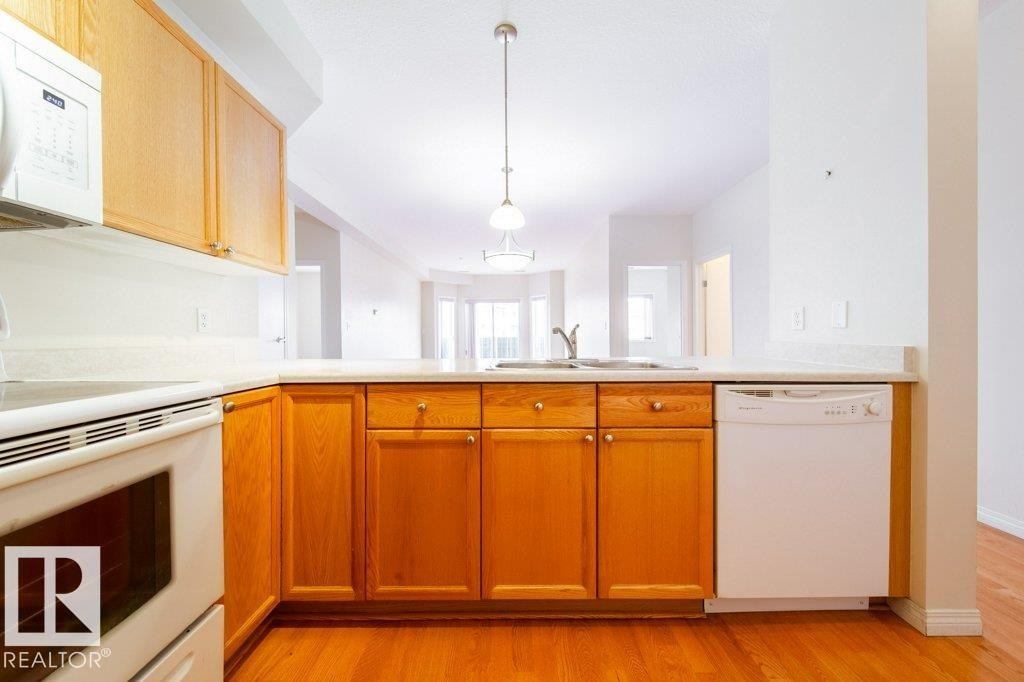 303 4304 139 Avenue, Edmonton, AB - Indoor Photo Showing Kitchen With Double Sink
