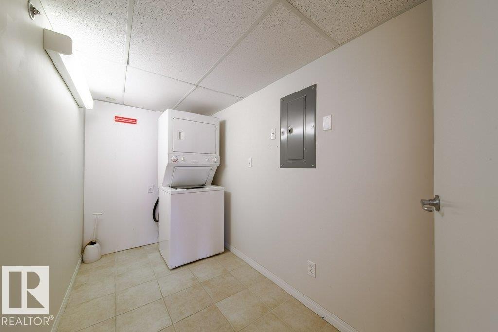 Large enough for extra storage and a freezer. - 303 4304 139 Avenue, Edmonton, AB - Indoor Photo Showing Laundry Room