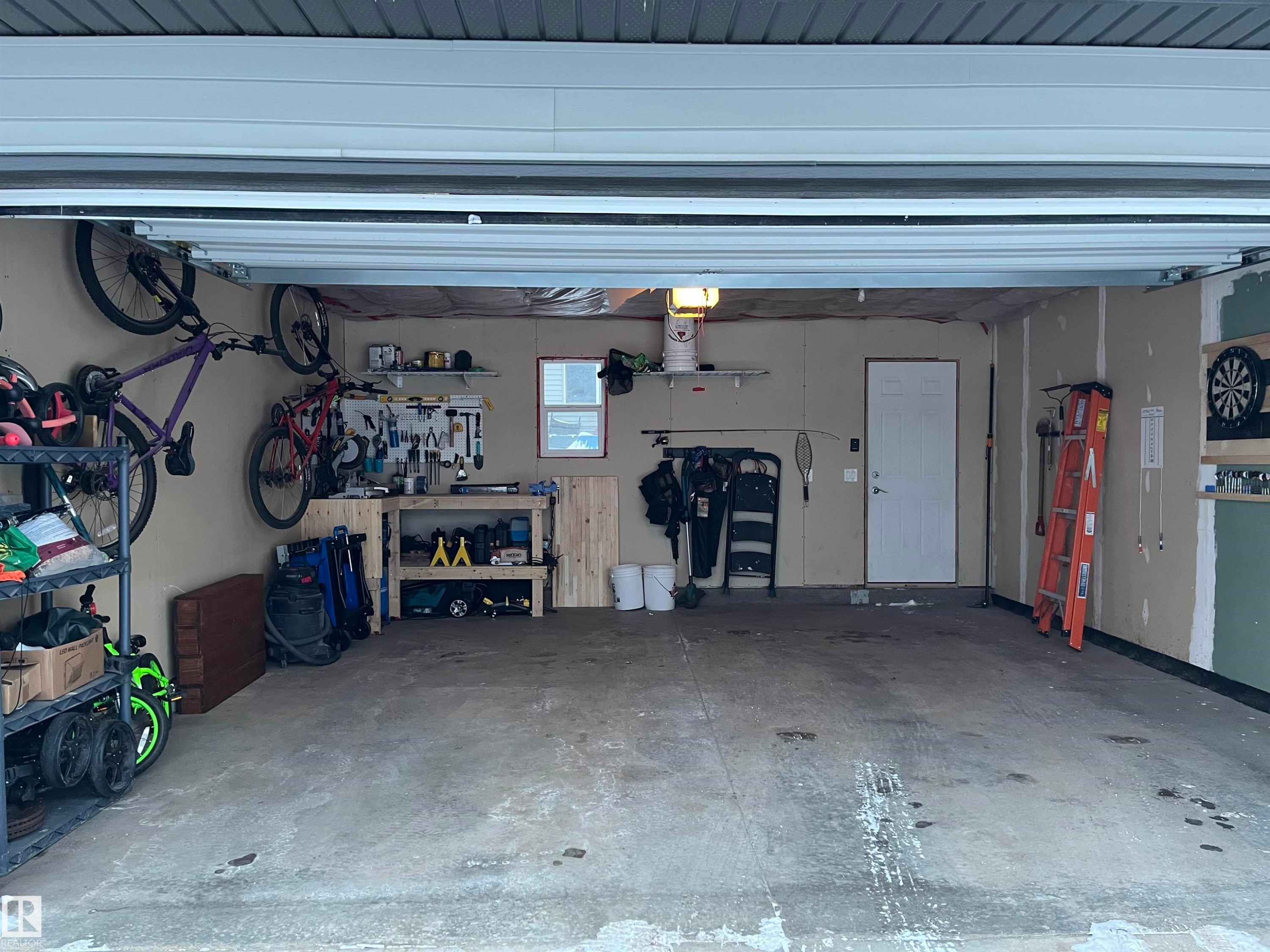 321 Pioneer Road, Spruce Grove, AB - Indoor Photo Showing Garage