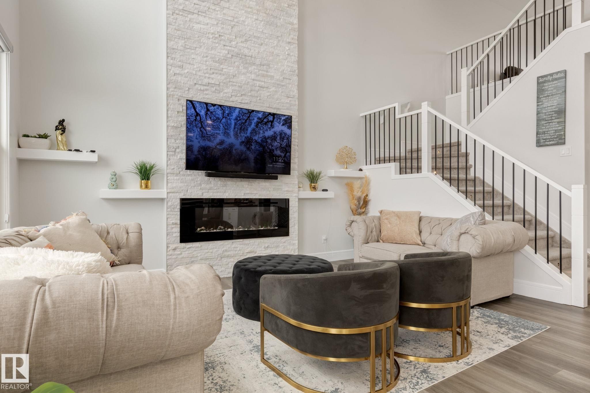 6456 King Wynd, Edmonton, AB - Indoor Photo Showing Living Room With Fireplace
