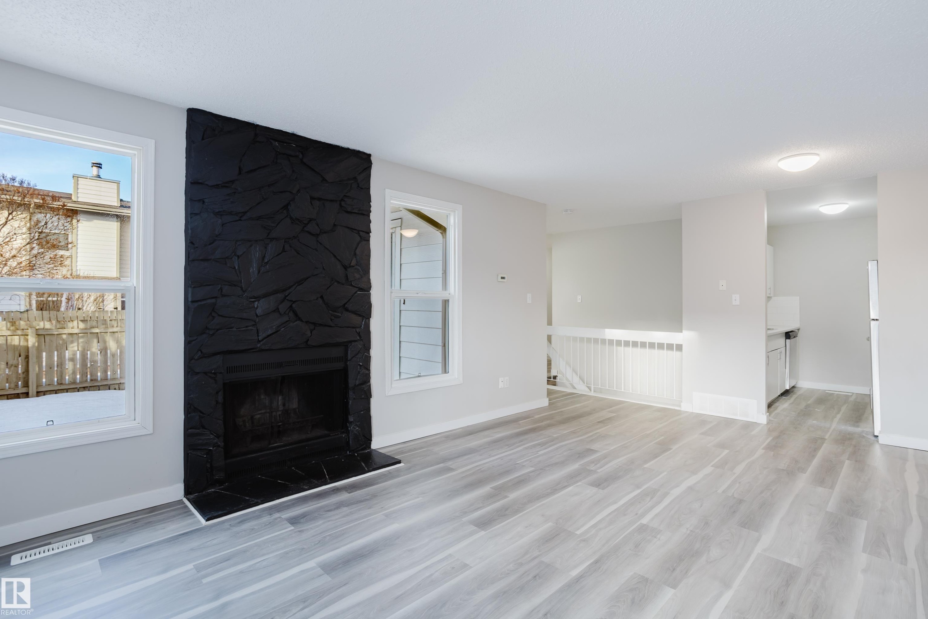 7032 Mill Woods Road S, Edmonton, AB - Indoor Photo Showing Living Room With Fireplace