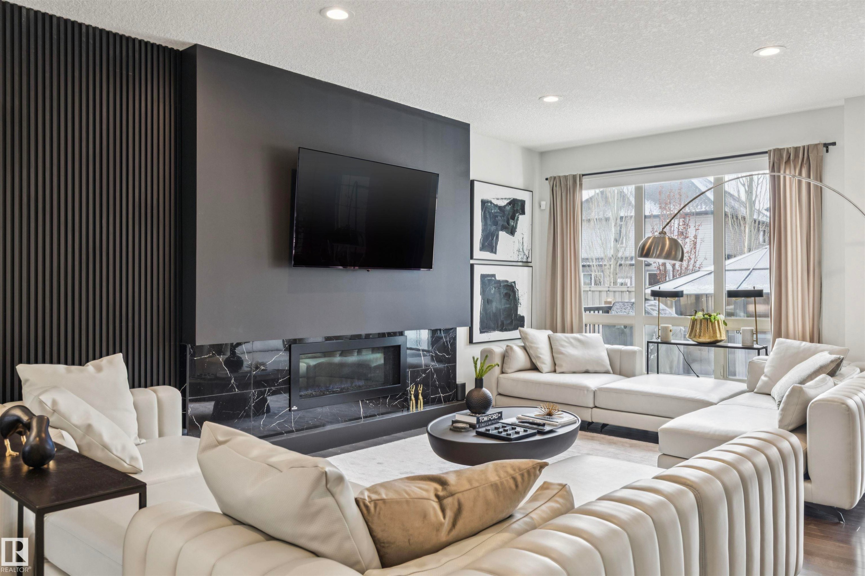 3112 Allan Landing Landing, Edmonton, AB - Indoor Photo Showing Living Room With Fireplace