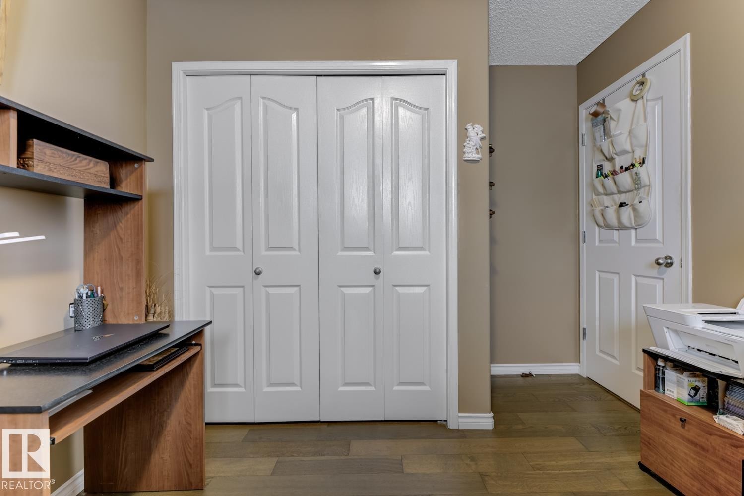 Office featuring dark wood-style floors and a textured ceiling - 20148 46 Avenue, Edmonton, AB - Indoor Photo Showing Other Room