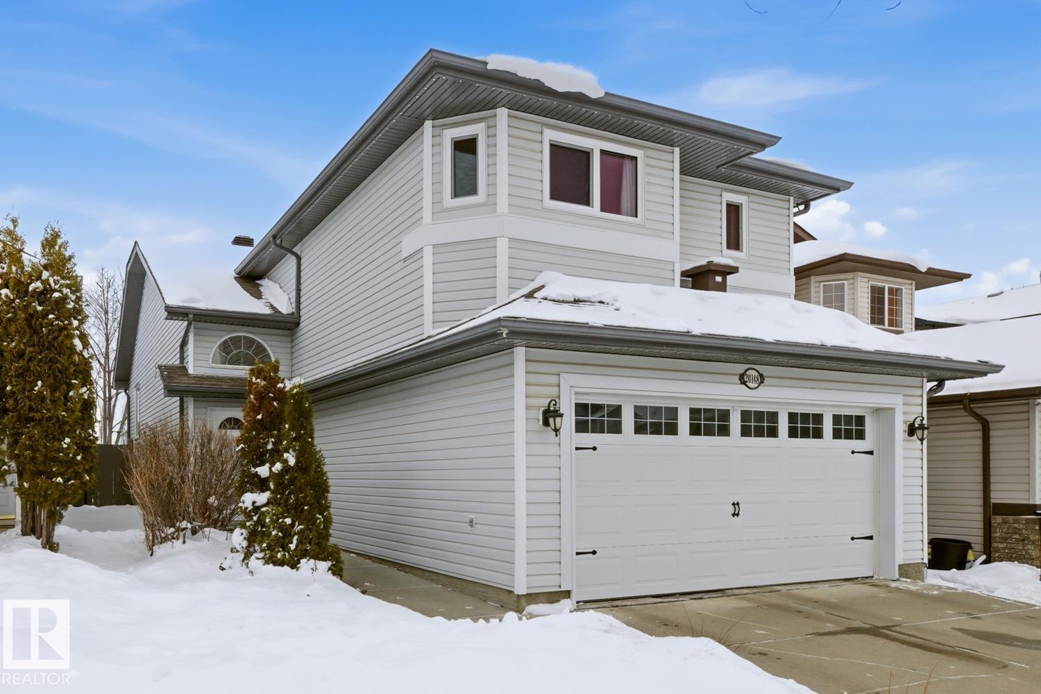 View of front of property featuring a garage - 20148 46 Avenue, Edmonton, AB - Outdoor
