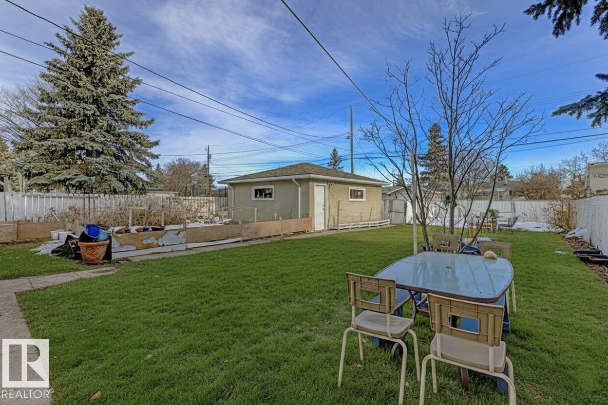 Fenced backyard with a patio - 13211 71 Street, Edmonton, AB - Outdoor With Backyard