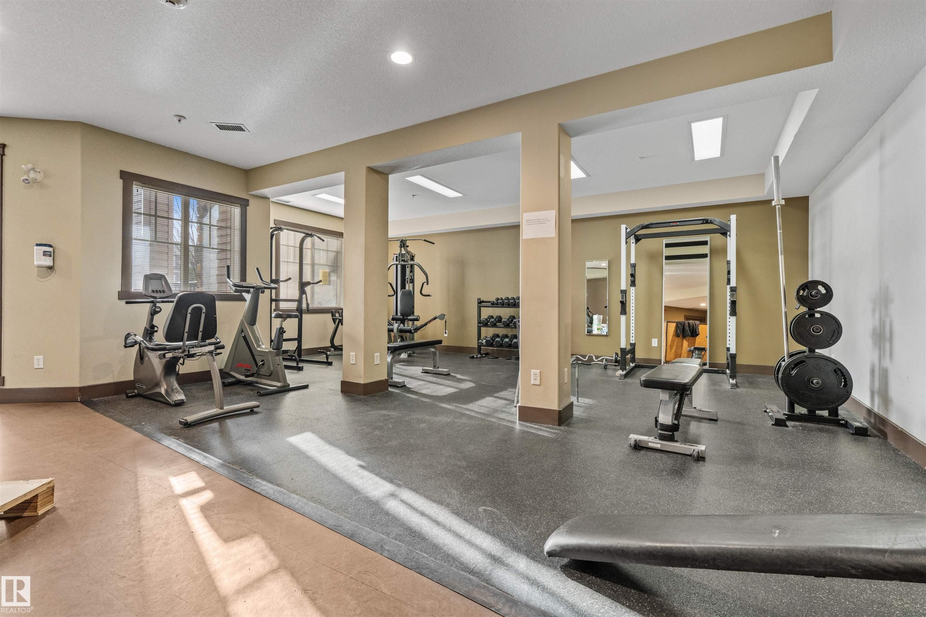 Edmonton, AB - Indoor Photo Showing Gym Room